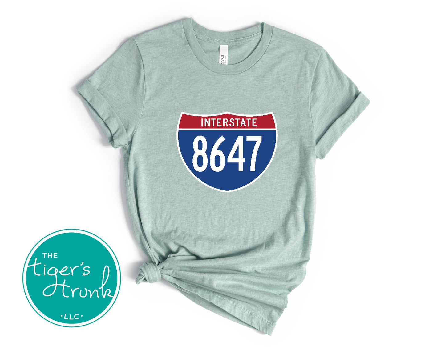 T-shirt featuring 8647 inside an Interstate sign, clean and bold design with a subtle political message