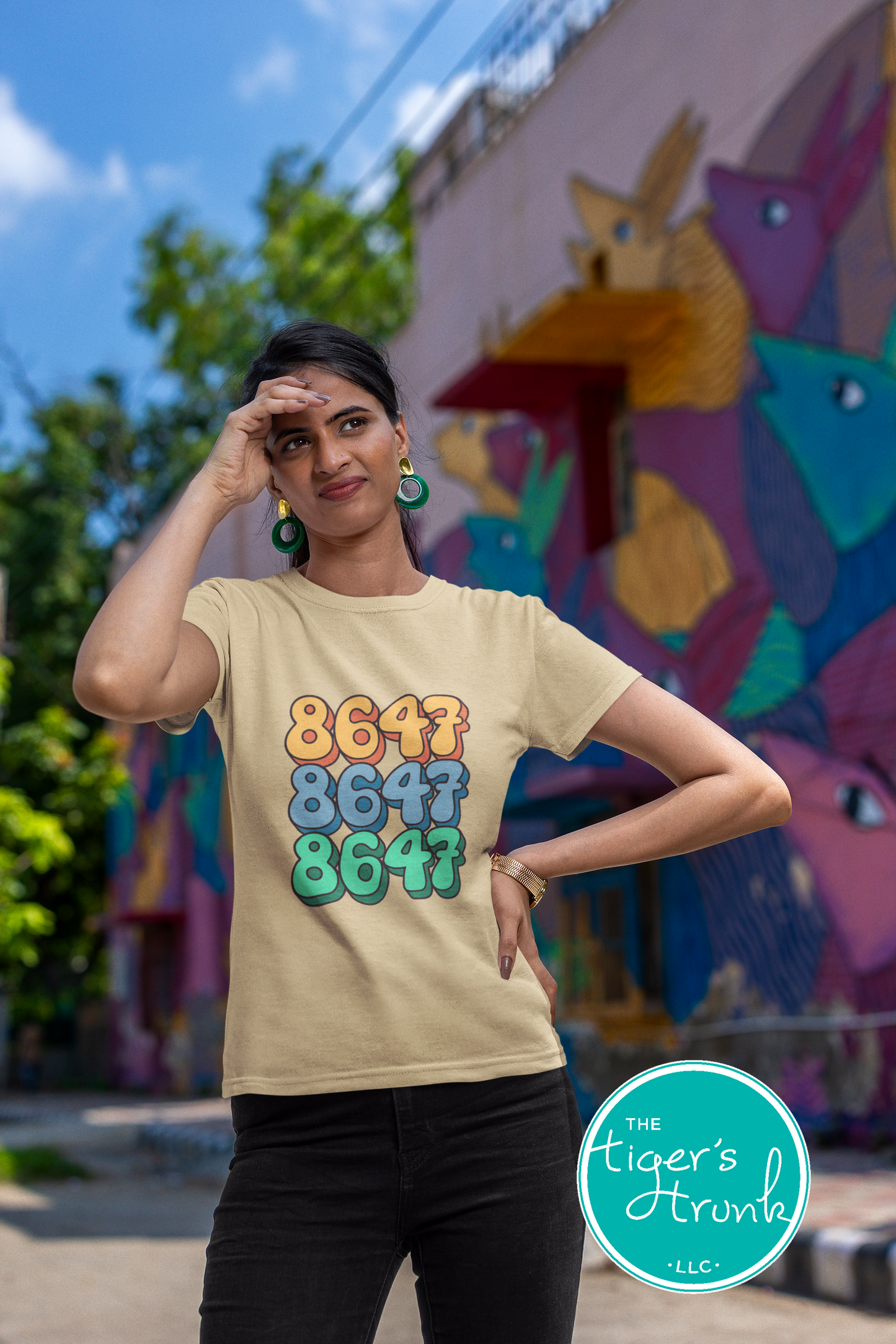 Close-up of a shirt featuring the number 8647, a subtle nod to resistance and activism.