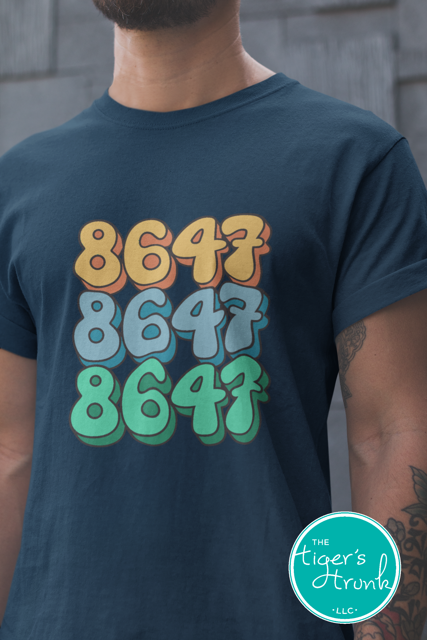 Close-up of a shirt featuring the number 8647, a subtle nod to resistance and activism.