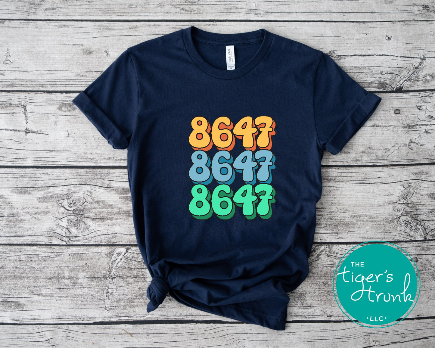 Close-up of a shirt featuring the number 8647, a subtle nod to resistance and activism.