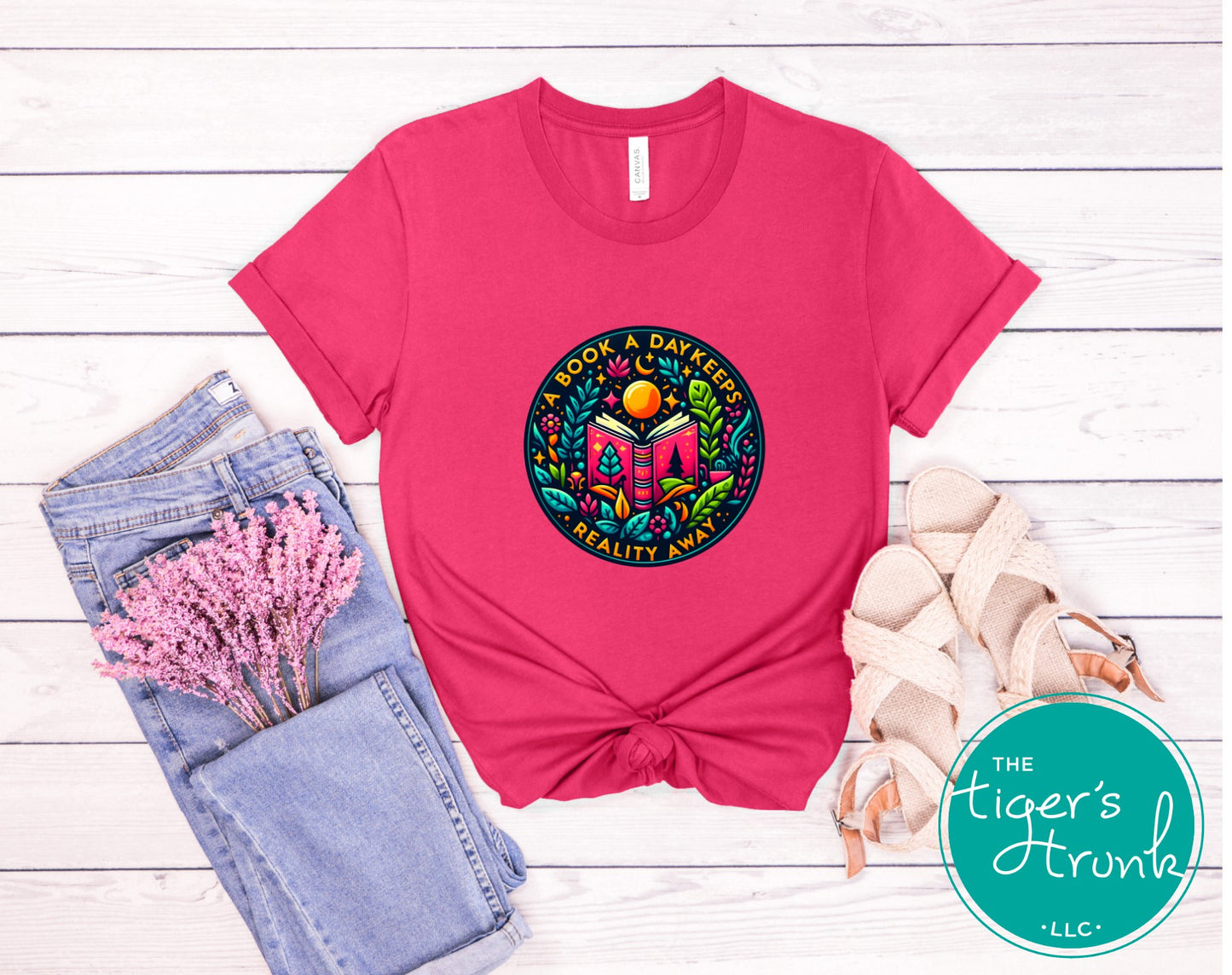 T-shirt with the phrase "A Book a Day Keeps Reality Away," perfect for readers, book lovers, and introverts
