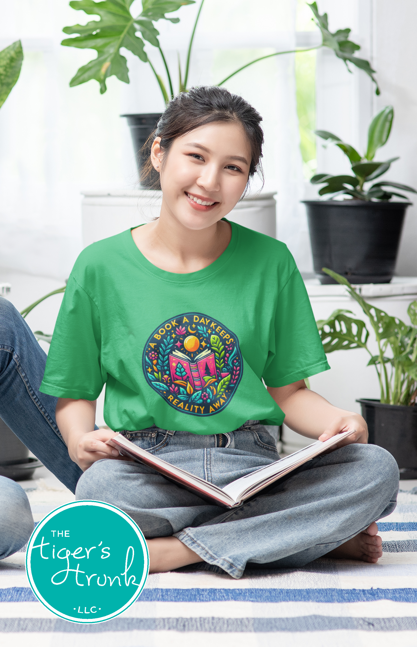 T-shirt with the phrase "A Book a Day Keeps Reality Away," perfect for readers, book lovers, and introverts