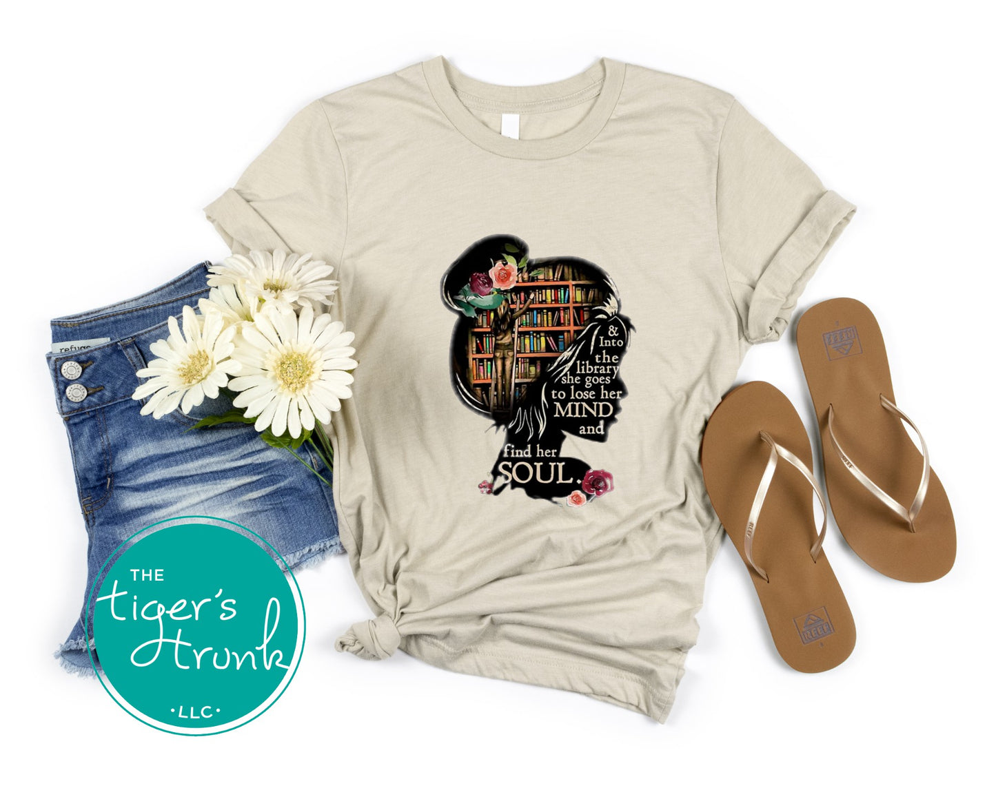 T-shirt with the quote "And to the Library She Goes to Lose Her Mind and Find Her Soul," perfect for readers and book lovers