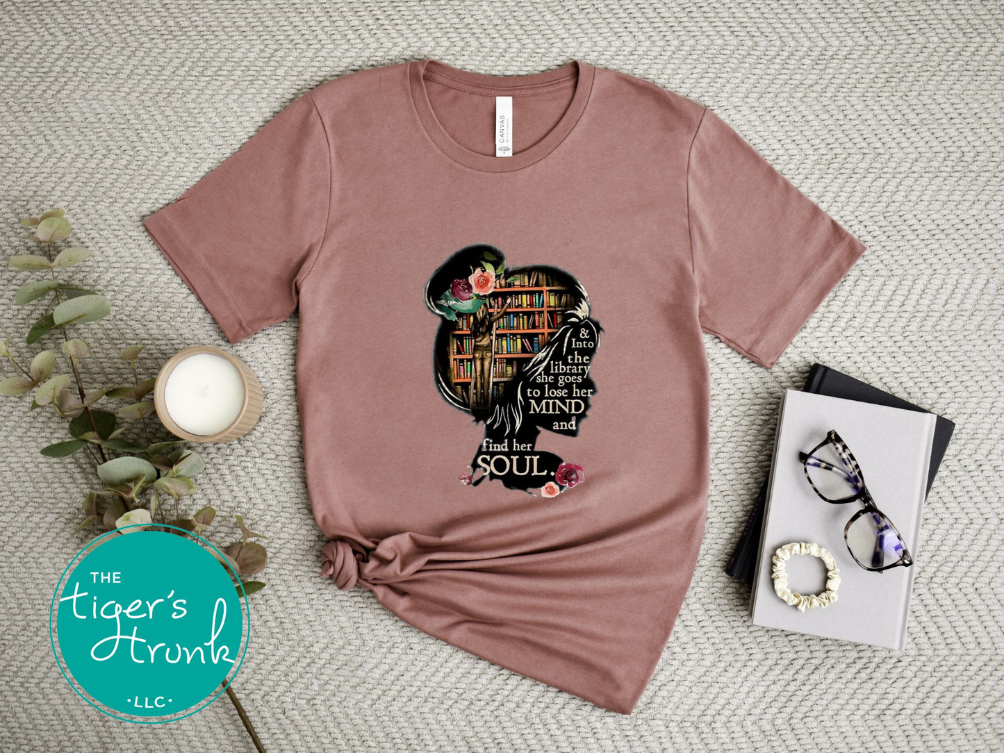 T-shirt with the quote "And to the Library She Goes to Lose Her Mind and Find Her Soul," perfect for readers and book lovers