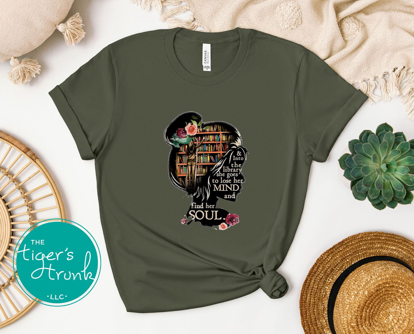 T-shirt with the quote "And to the Library She Goes to Lose Her Mind and Find Her Soul," perfect for readers and book lovers