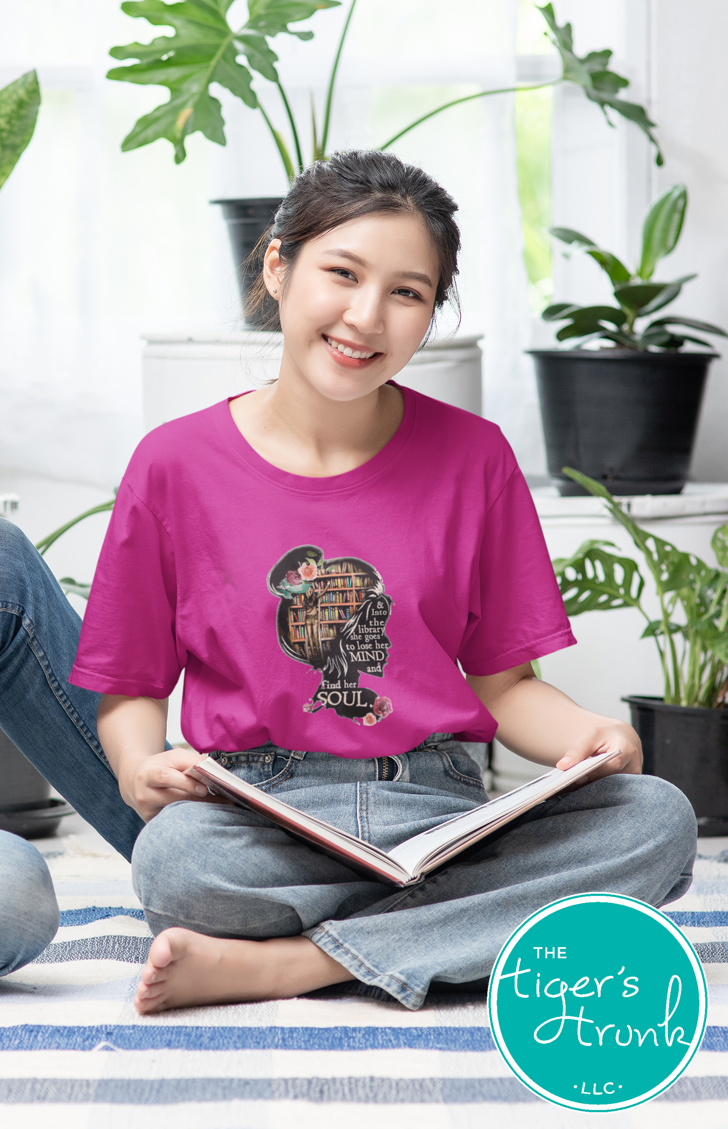 T-shirt with the quote "And to the Library She Goes to Lose Her Mind and Find Her Soul," perfect for readers and book lovers