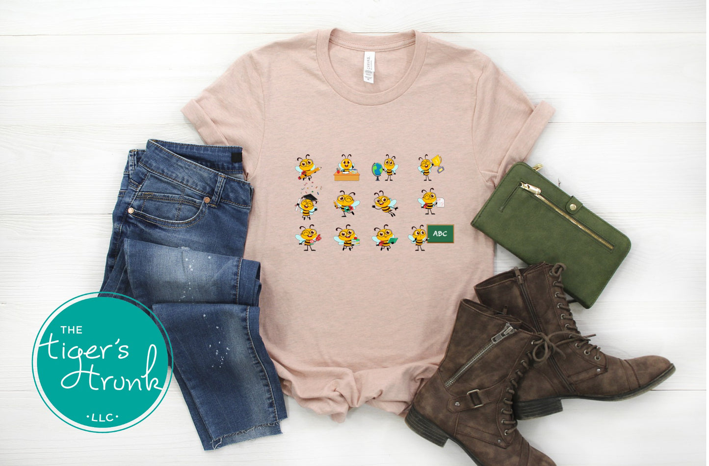 Graphic t-shirt with cartoon bees doing teacher tasks, playful and fun design perfect for school staff and educators