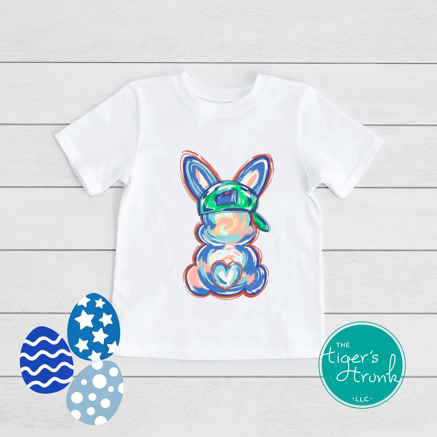 Easter t-shirt with a watercolor blue bunny wearing a ball cap, perfect for fun and casual spring celebrations