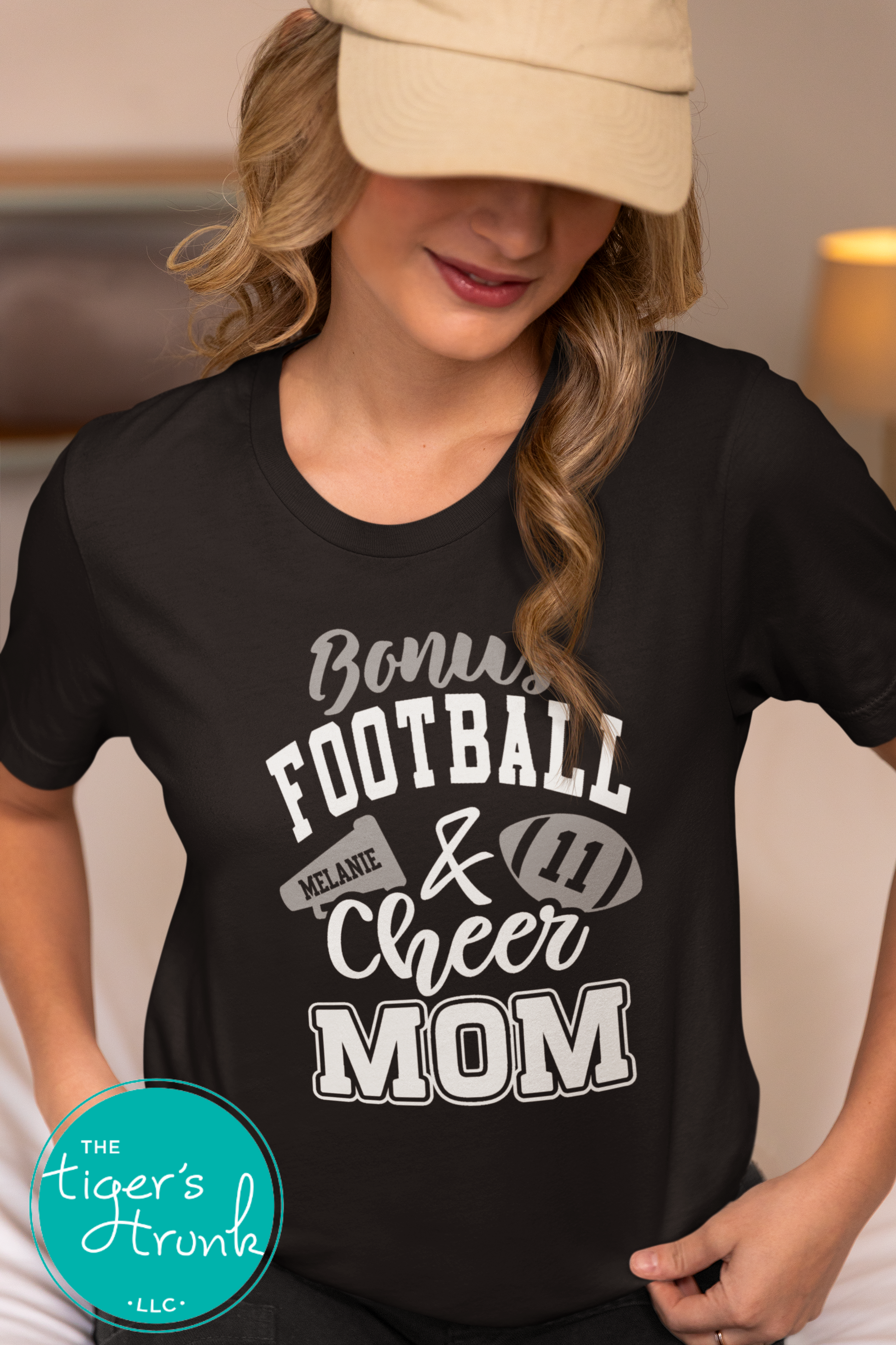Personalized Bonus Mom shirt with football and megaphone, customized with player and cheerleader names, jersey number, and school colors