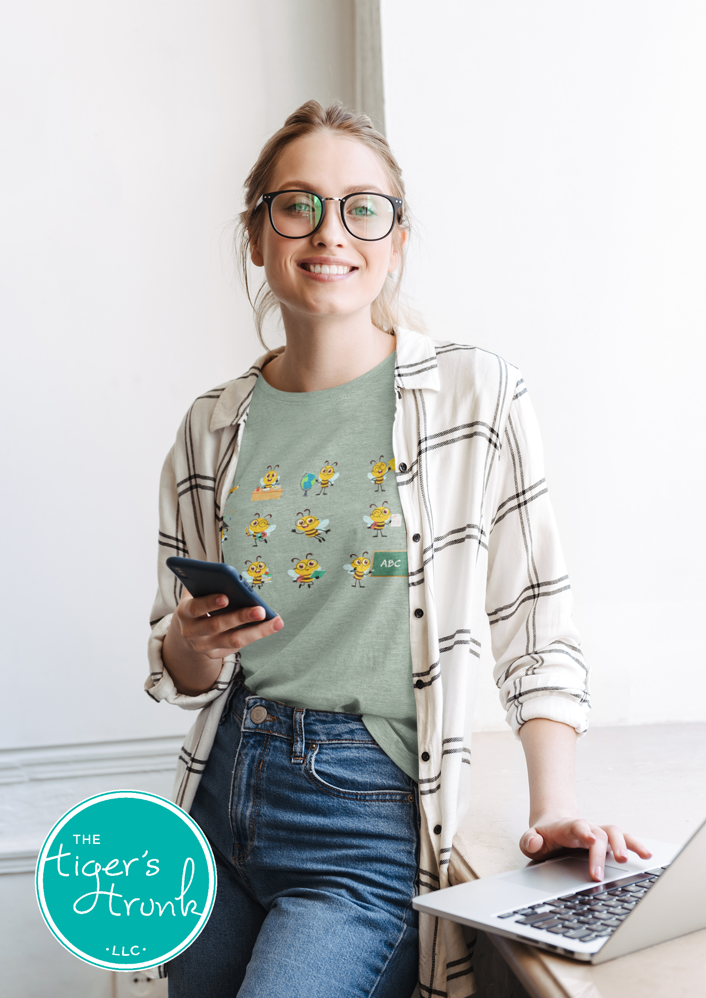Graphic t-shirt with cartoon bees doing teacher tasks, playful and fun design perfect for school staff and educators