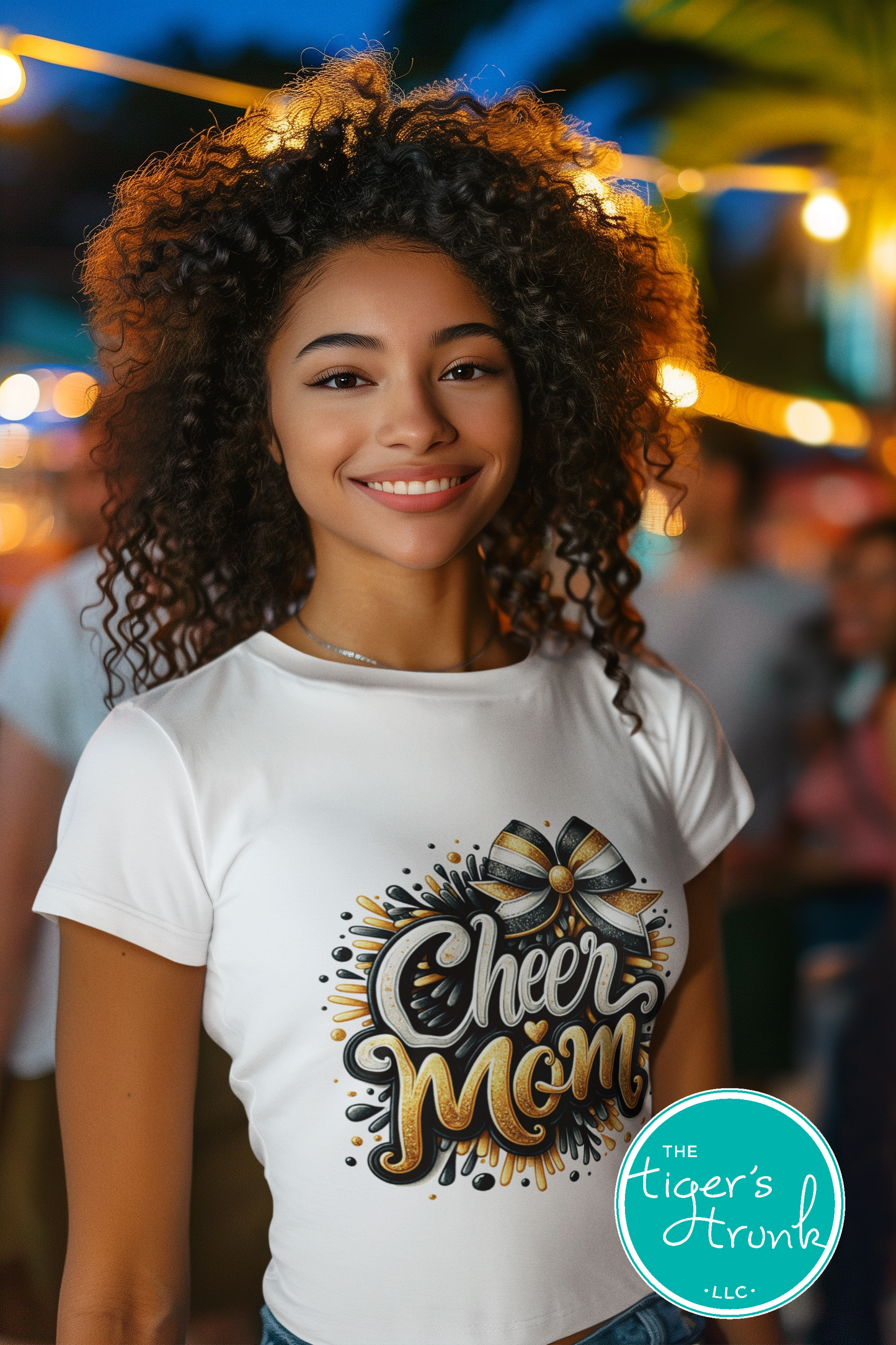 Person wearing a 'Cheer Mom' t-shirt with a blurred background