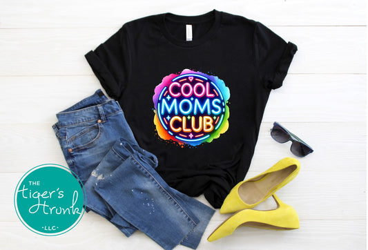 Graphic t-shirt with Cool Mom's Club text in neon colors, fun and trendy design for stylish moms