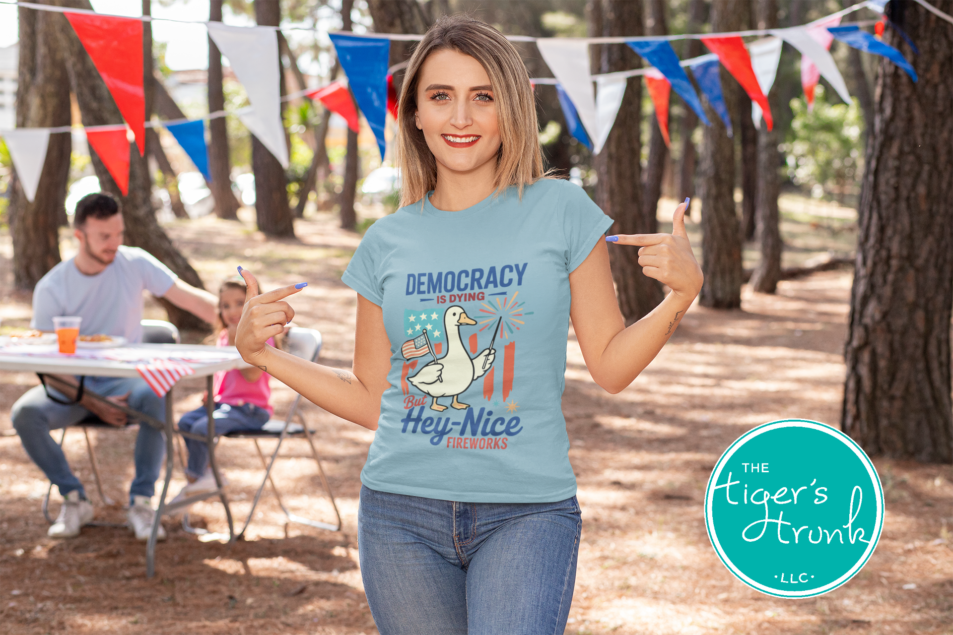 Funny Fourth of July t-shirt with goose holding sparkler and flag, reading Democracy Is Dying But Hey, Nice Fireworks