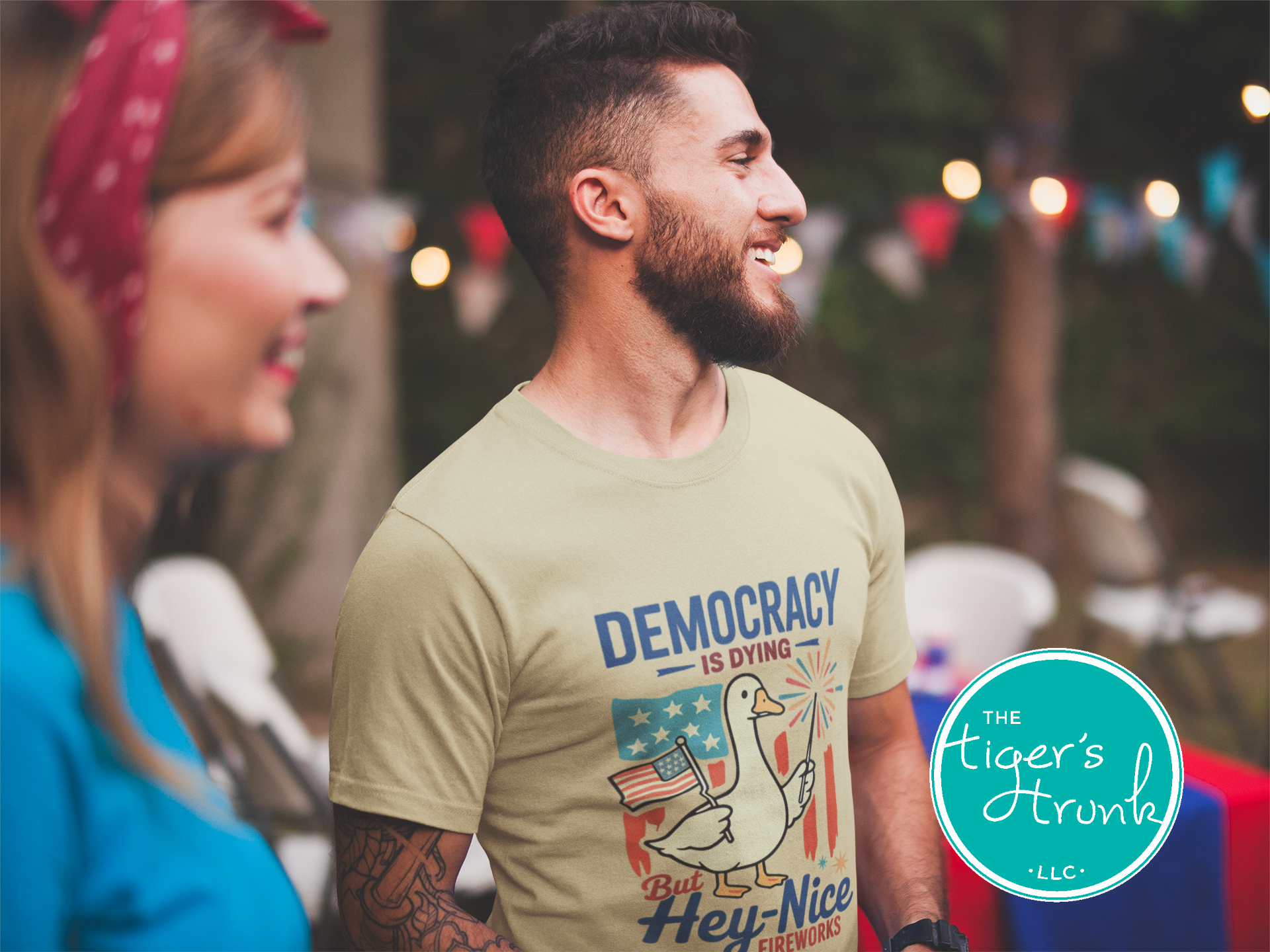 Funny Fourth of July t-shirt with goose holding sparkler and flag, reading Democracy Is Dying But Hey, Nice Fireworks