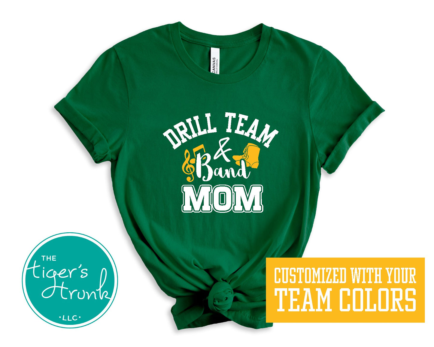 Green t-shirt with 'Drill Team & Band Mom' text and Tiger's Trunk logo on a white background