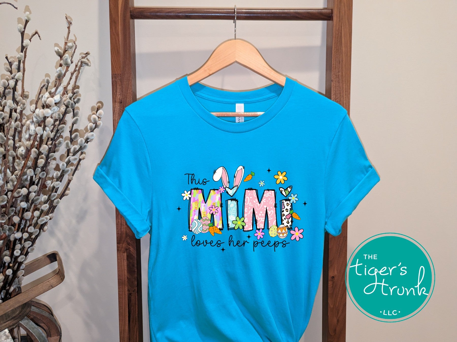 Easter t-shirt with "Mimi" in pastel spring print font, featuring bunnies and florals, perfect for holiday photos and egg hunts