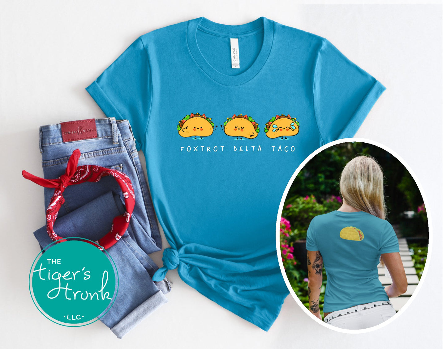 Blue t-shirt with cartoon tacos and jeans on a white background, featuring 'The Tiger's Trunk' brand.