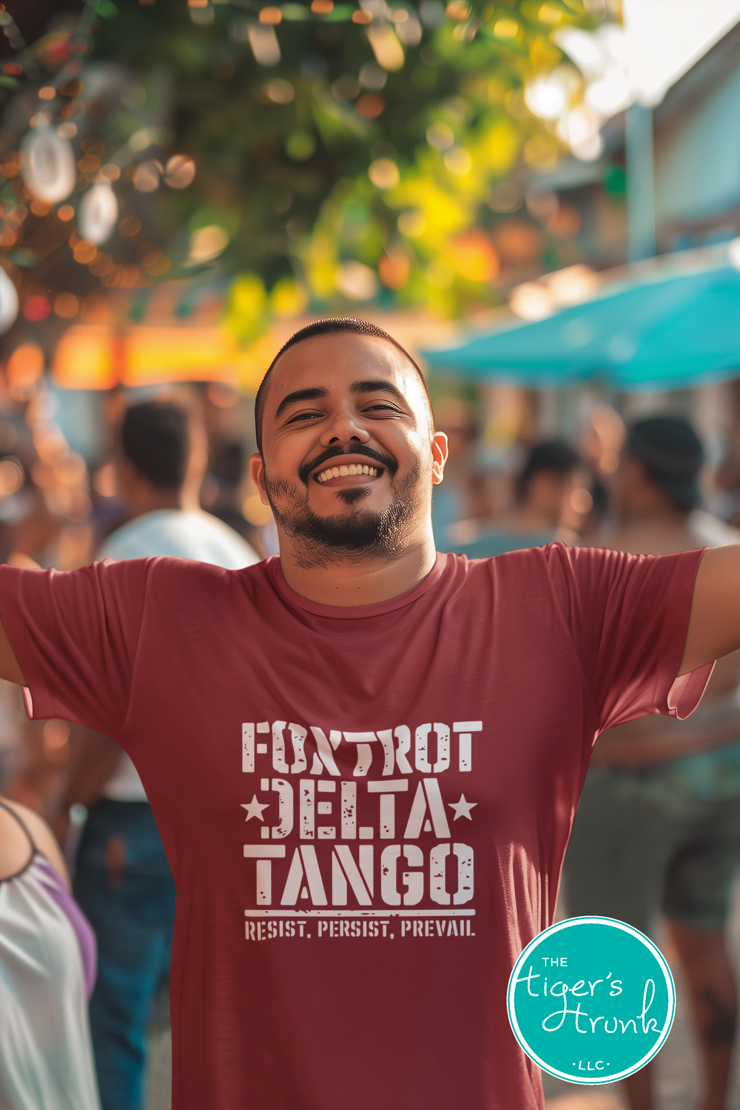 Man wearing a red t-shirt with text in an outdoor setting