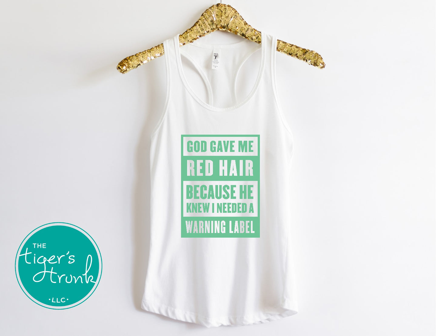 Funny St. Patrick’s Day tank top featuring God Gave Me Red Hair Because He Knew I Needed a Warning Label in a festive Irish design