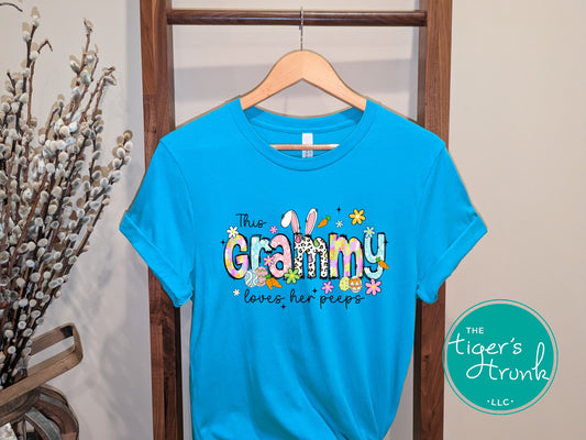 Easter t-shirt for Grammy with spring print font including bunnies, eggs, and flowers, designed for festive holiday wear