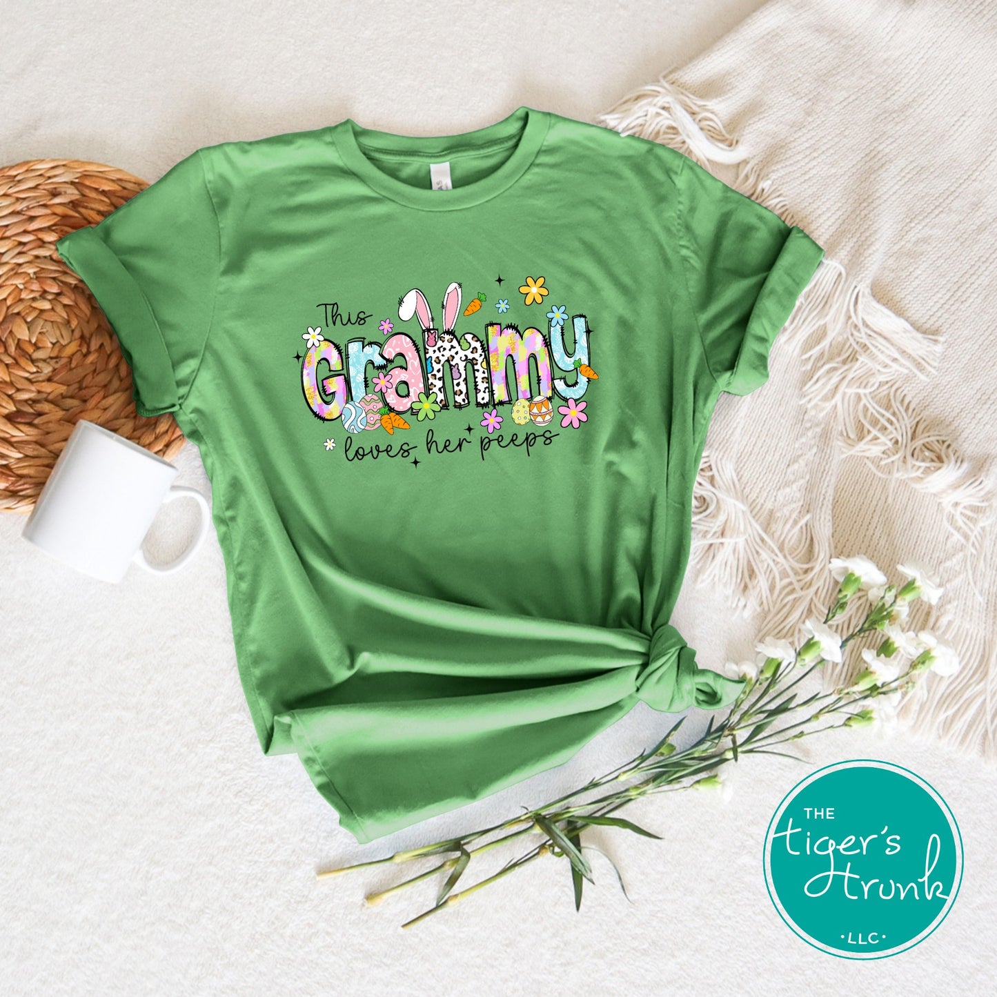 Easter t-shirt for Grammy with spring print font including bunnies, eggs, and flowers, designed for festive holiday wear