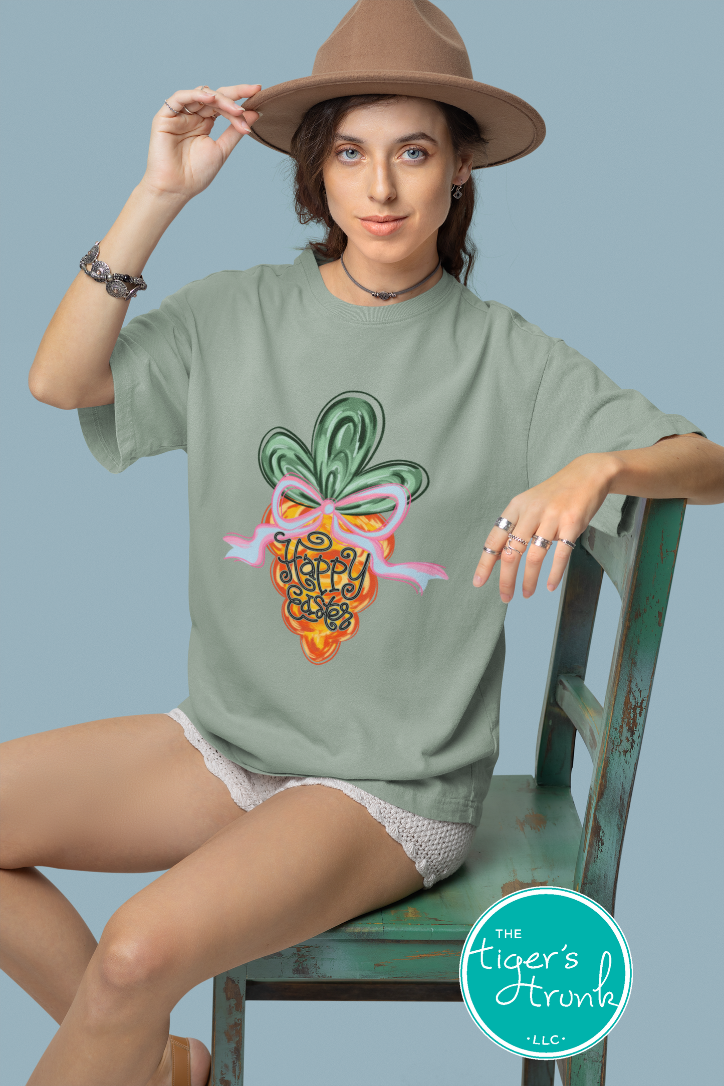 Easter t-shirt with Happy Easter text and watercolor carrot design, soft pastel spring look perfect for the holiday season.