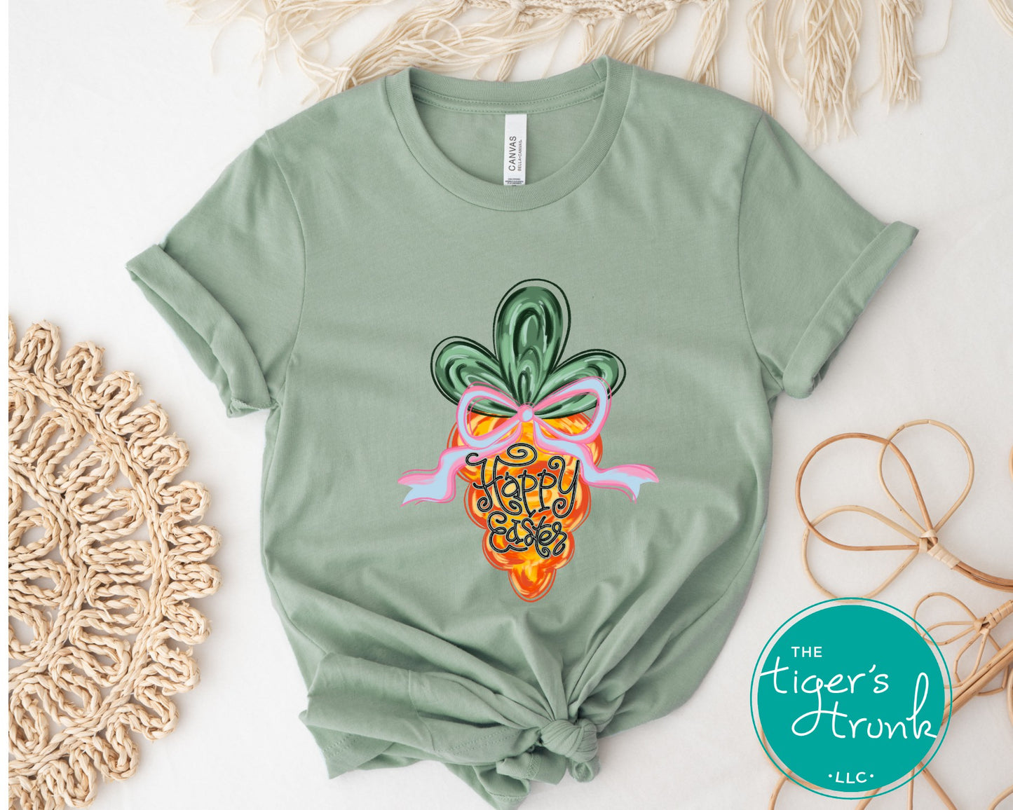 Easter t-shirt with Happy Easter text and watercolor carrot design, soft pastel spring look perfect for the holiday season.