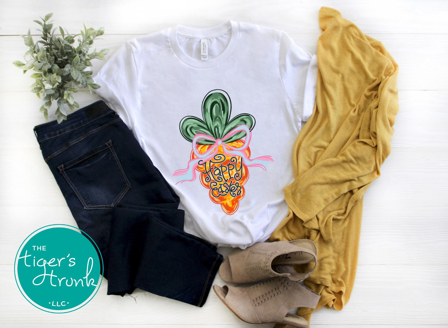 Easter t-shirt with Happy Easter text and watercolor carrot design, soft pastel spring look perfect for the holiday season.