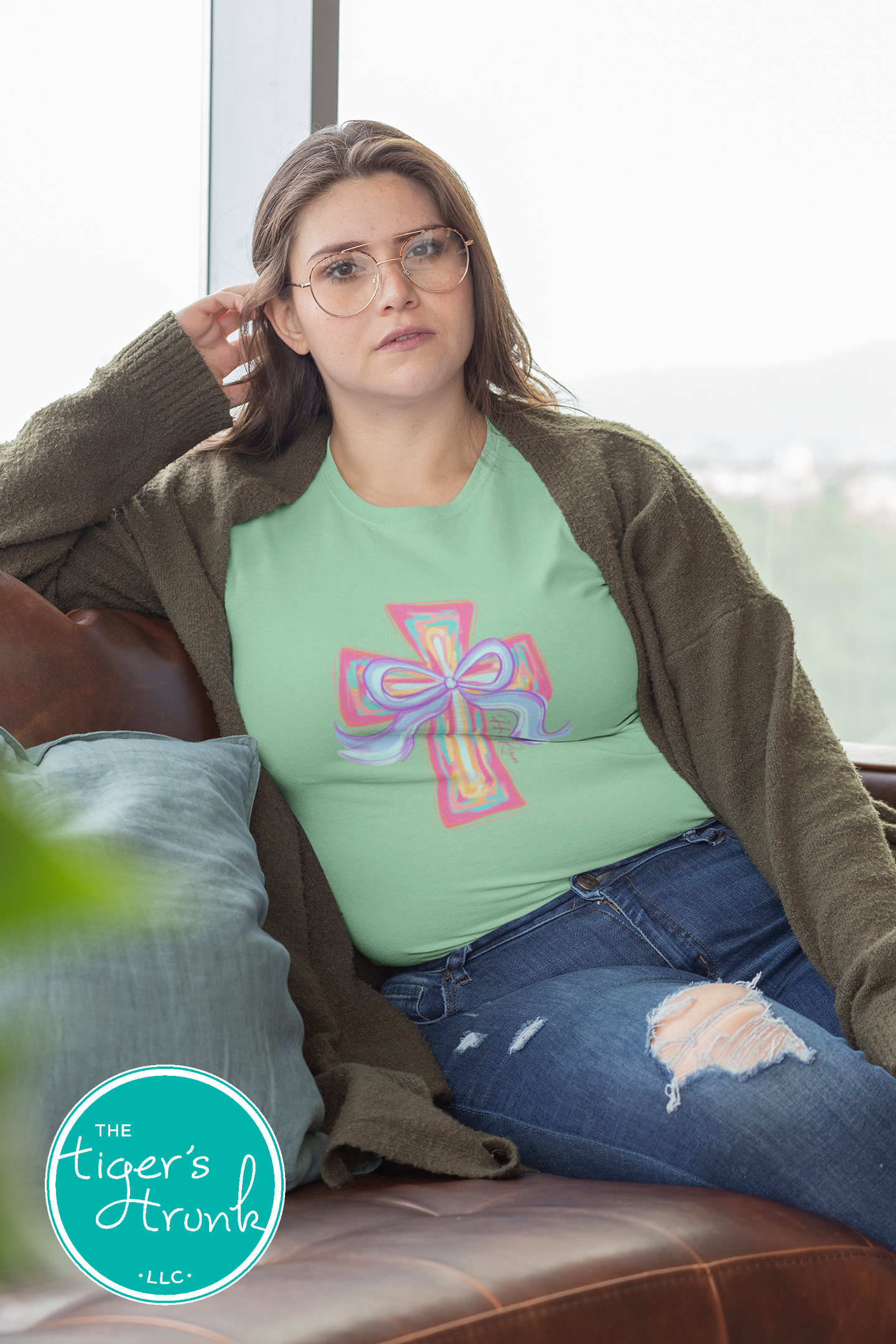 Christian Easter t-shirt with watercolor cross and He Is Risen message, designed for faith-based spring celebrations