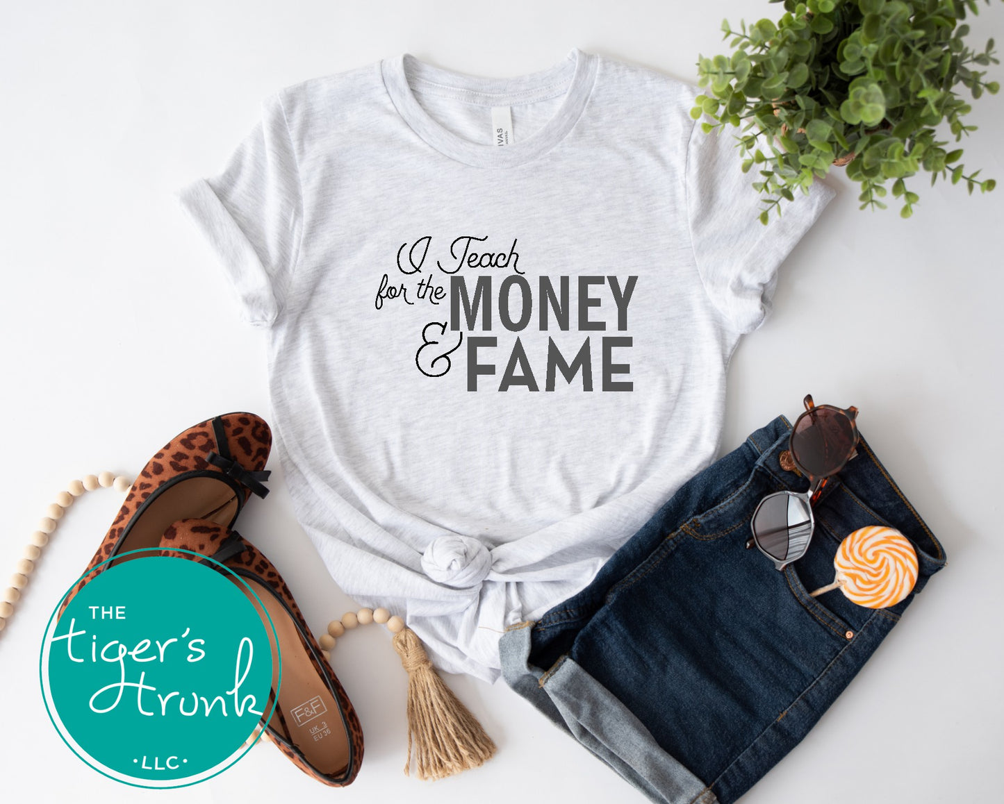 T-shirt with the phrase "I Teach for the Money & Fame," humorous and sarcastic gift for teachers and school staff