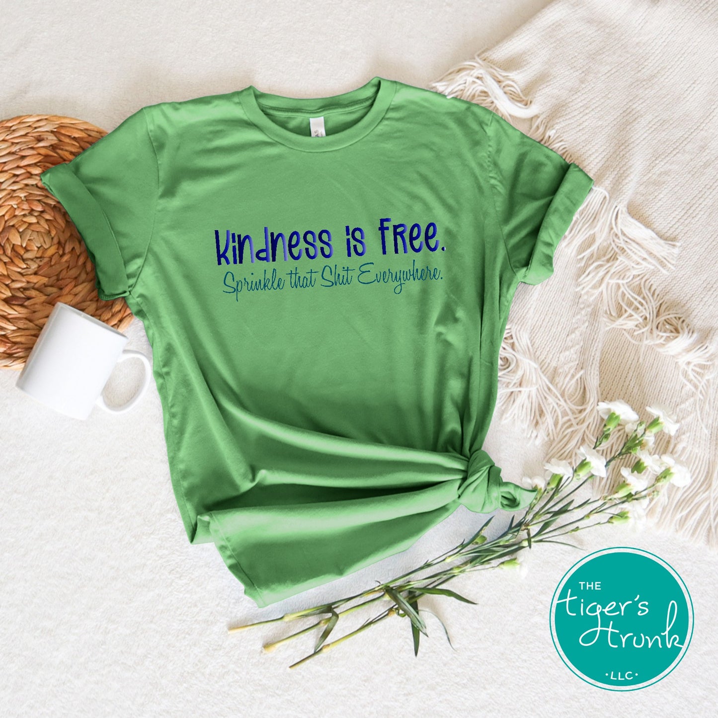 Funny and empowering Kindness Is Free t-shirt with “Sprinkle That Shit Everywhere” quote. A comfy tee perfect for spreading good vibes and sass.