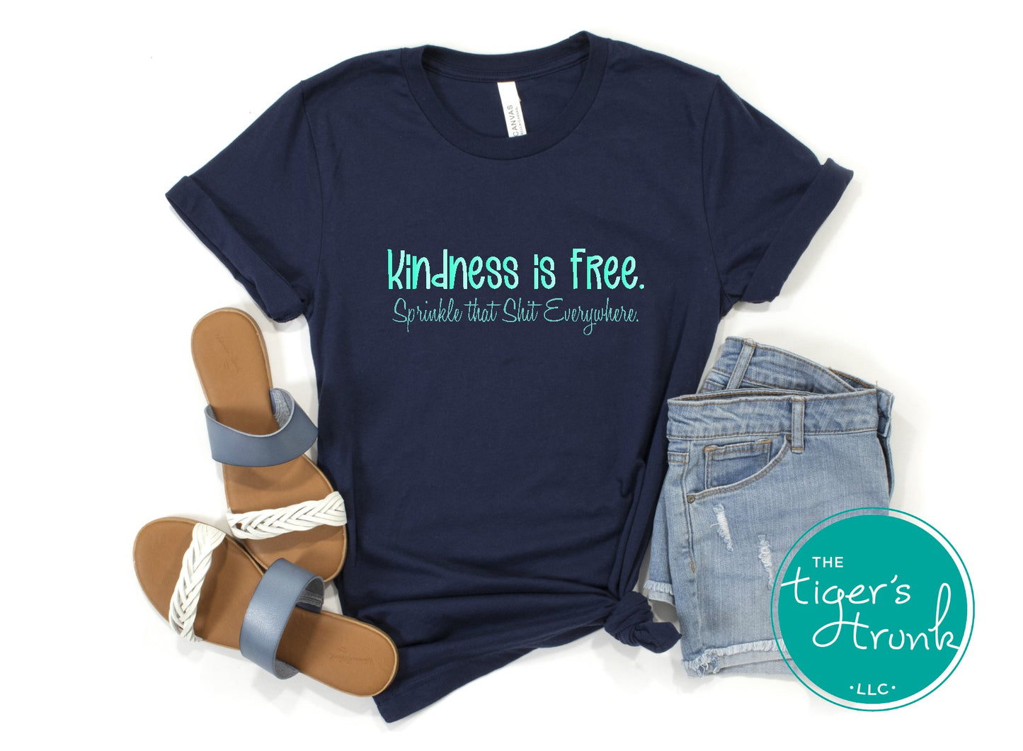 Funny and empowering Kindness Is Free t-shirt with “Sprinkle That Shit Everywhere” quote. A comfy tee perfect for spreading good vibes and sass.