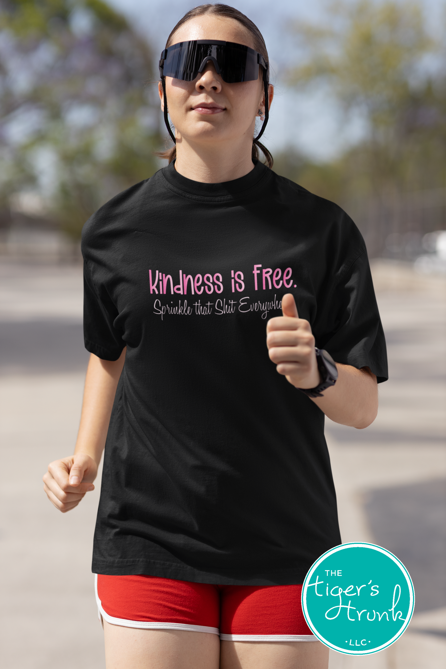 Funny and empowering Kindness Is Free t-shirt with “Sprinkle That Shit Everywhere” quote. A comfy tee perfect for spreading good vibes and sass.