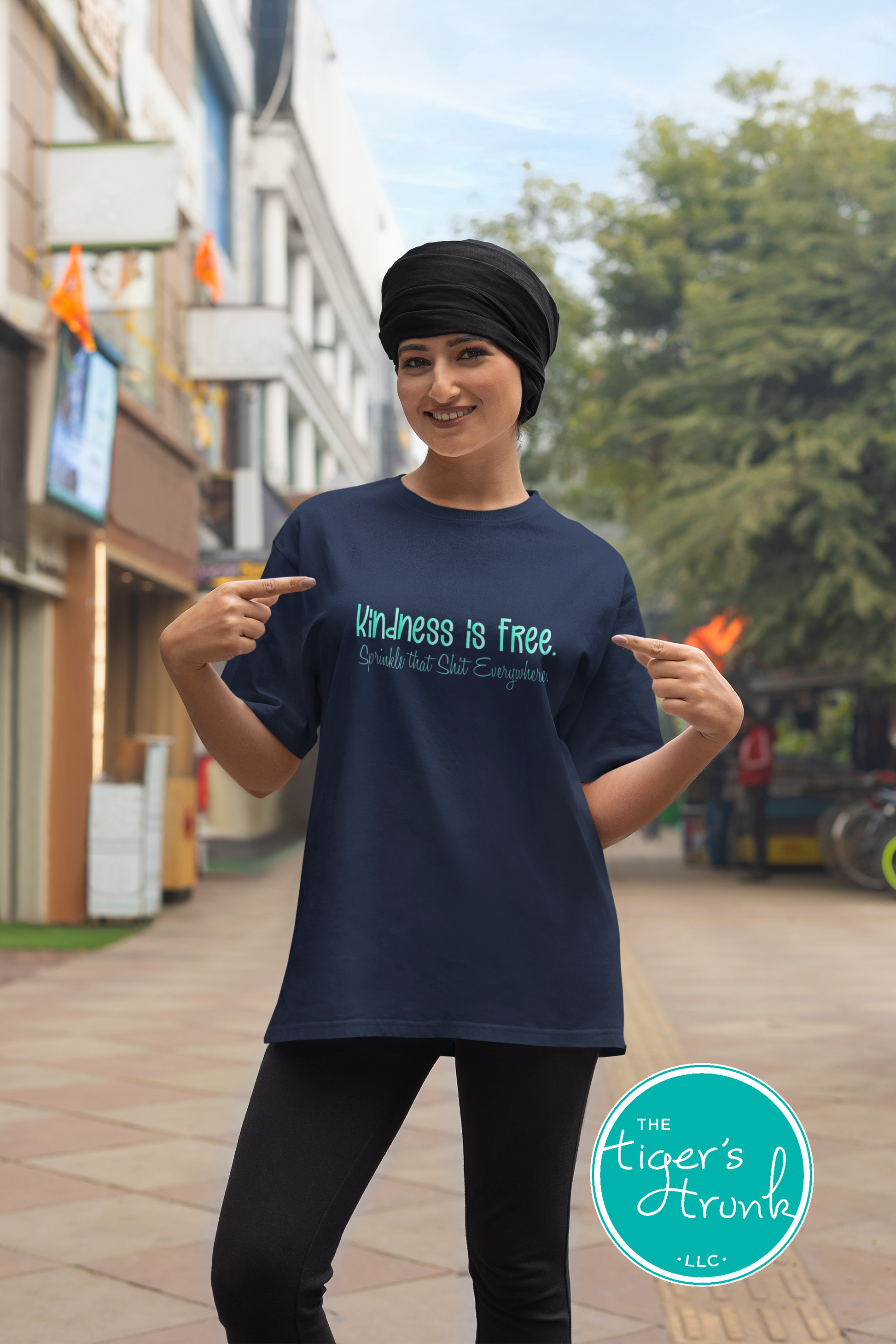 Funny and empowering Kindness Is Free t-shirt with “Sprinkle That Shit Everywhere” quote. A comfy tee perfect for spreading good vibes and sass.