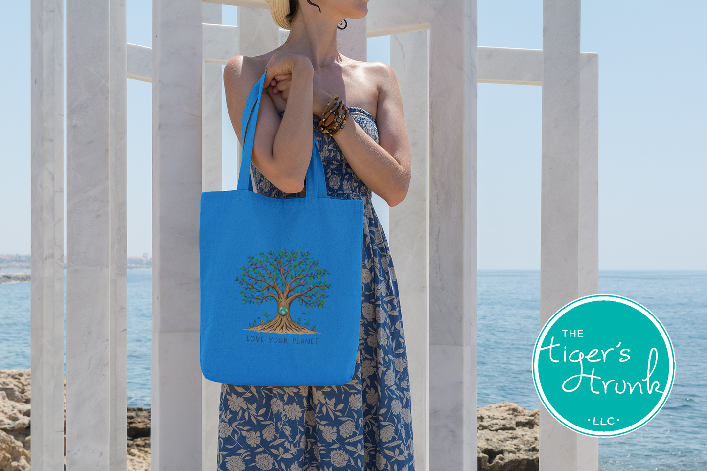 Cotton canvas tote bag with "Love Your Planet" and a tree with globe design, reusable and sturdy for books, groceries, or everyday use