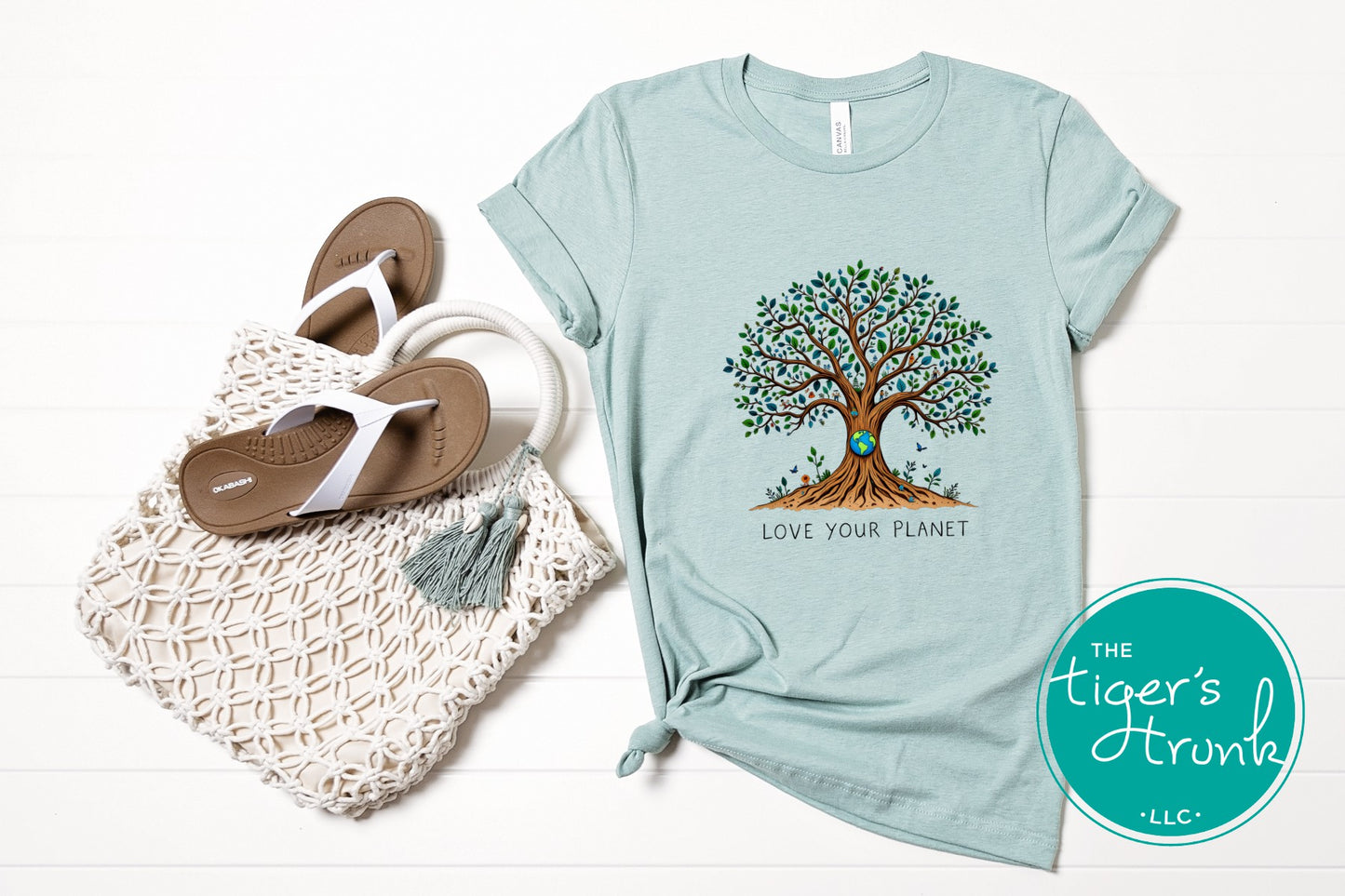 T-shirt with "Love Your Planet" message and tree with Earth design, perfect for eco-conscious wear, nature lovers, and Earth Day events