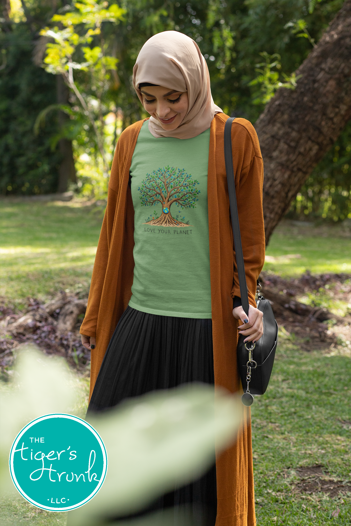 T-shirt with "Love Your Planet" message and tree with Earth design, perfect for eco-conscious wear, nature lovers, and Earth Day events