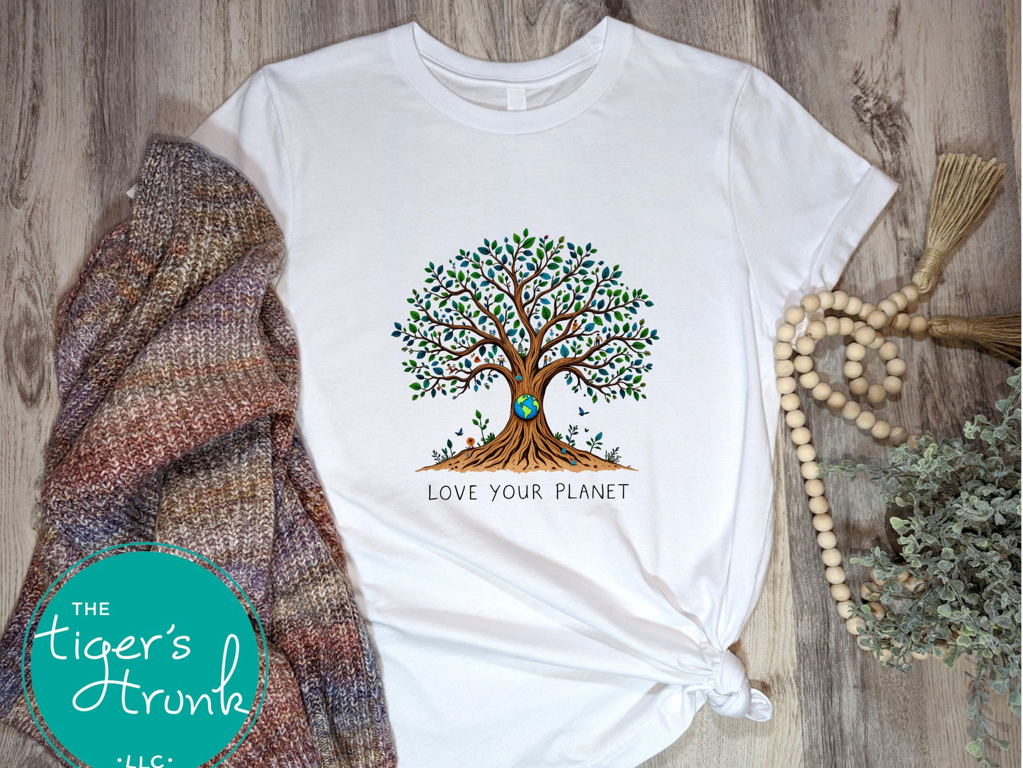 T-shirt with "Love Your Planet" message and tree with Earth design, perfect for eco-conscious wear, nature lovers, and Earth Day events