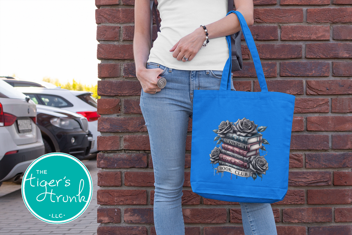 Polyester canvas tote bag with "Morally Grey Book Club" design, featuring large main section and outer pocket, ideal for book lovers and romance readers