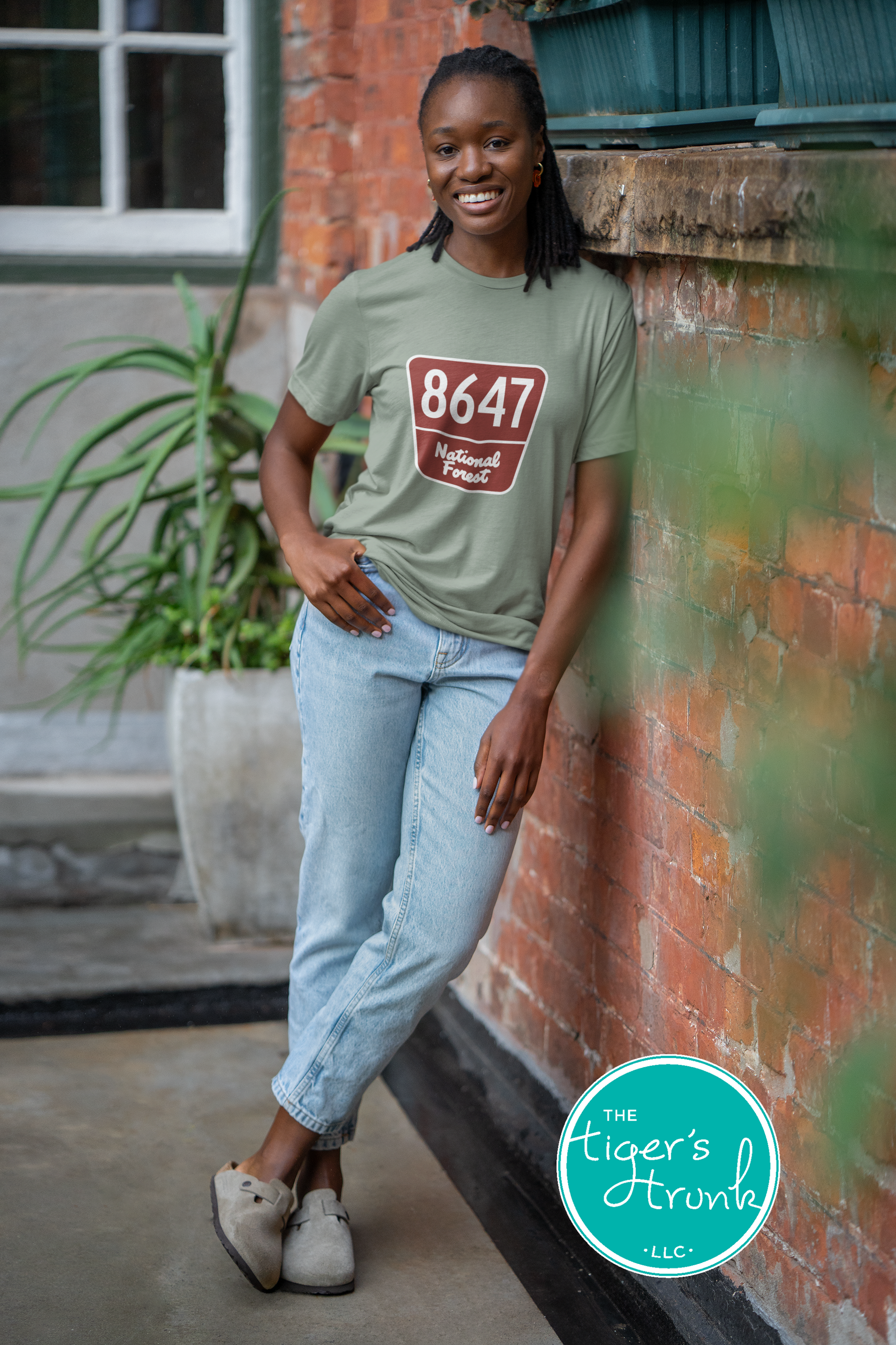 T-shirt with 8647 on a National Forest-style sign, earthy and subtle political protest design for nature lovers