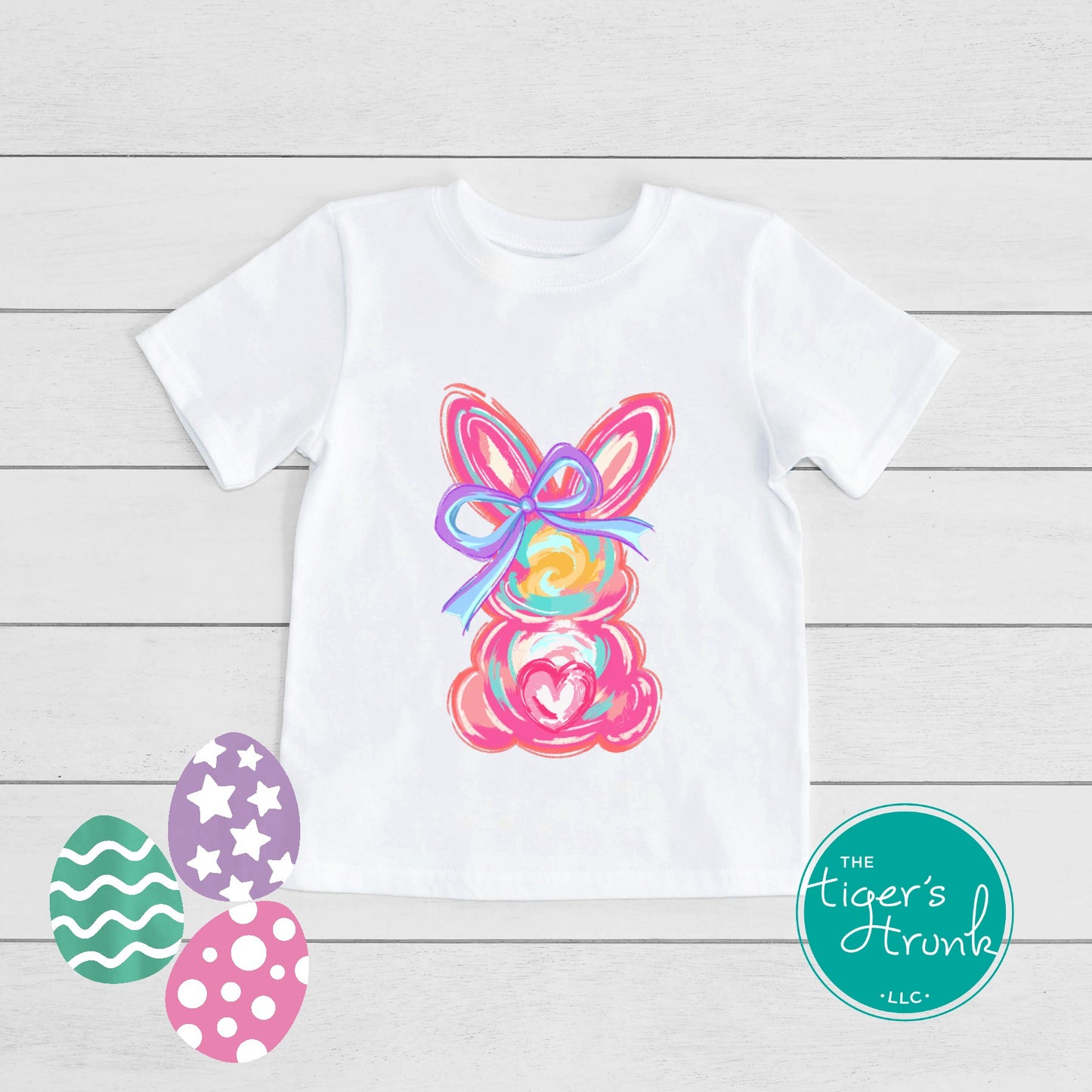 Easter t-shirt with a watercolor pink bunny design, soft and sweet pastel style perfect for spring holiday outfits.