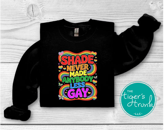 Sweatshirt with rainbow graphic and the phrase “Shade Never Made Anybody Less Gay,” LGBTQ+ Pride pullover for warmth and queer humor