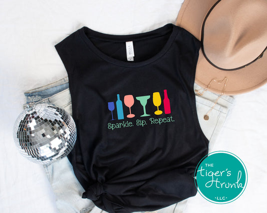 Muscle tank top with the phrase “Sparkle, Sip, Repeat” and rainbow drinkware, LGBTQ+ Pride graphic shirt for parties and celebrations