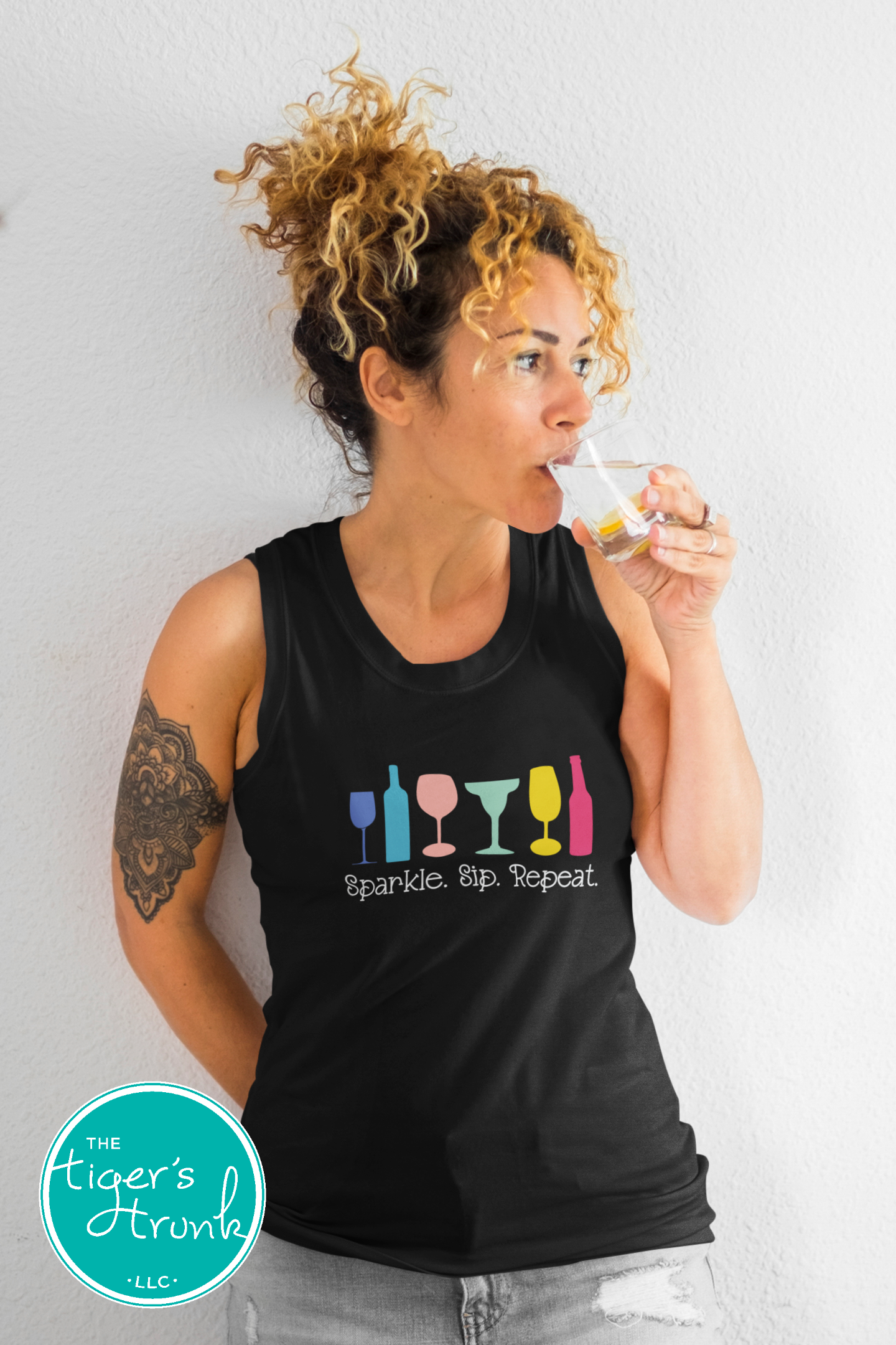 Muscle tank top with the phrase “Sparkle, Sip, Repeat” and rainbow drinkware, LGBTQ+ Pride graphic shirt for parties and celebrations
