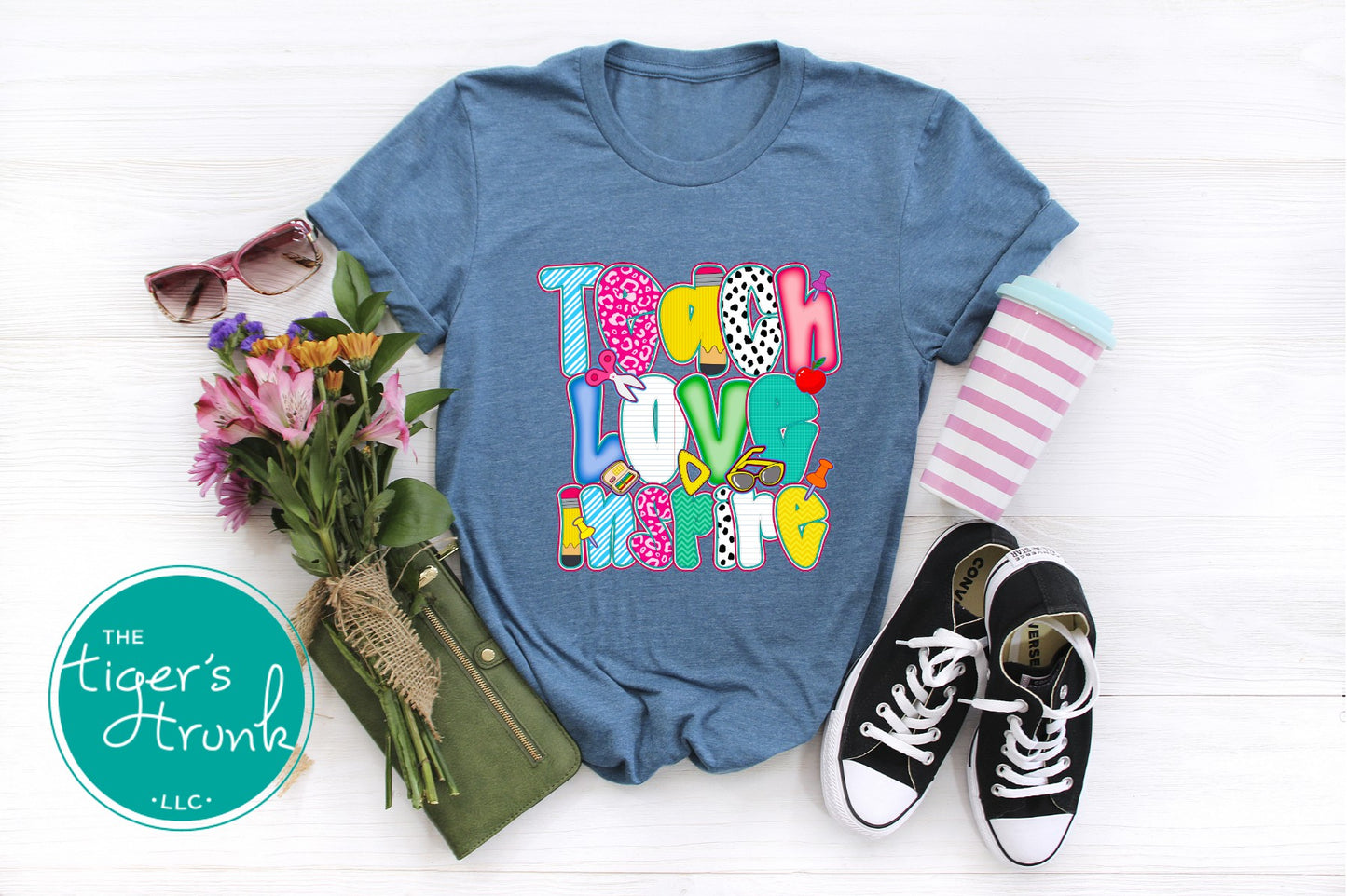 T-shirt with "Teach Love Inspire" message, inspirational and positive graphic tee for teachers and school staff