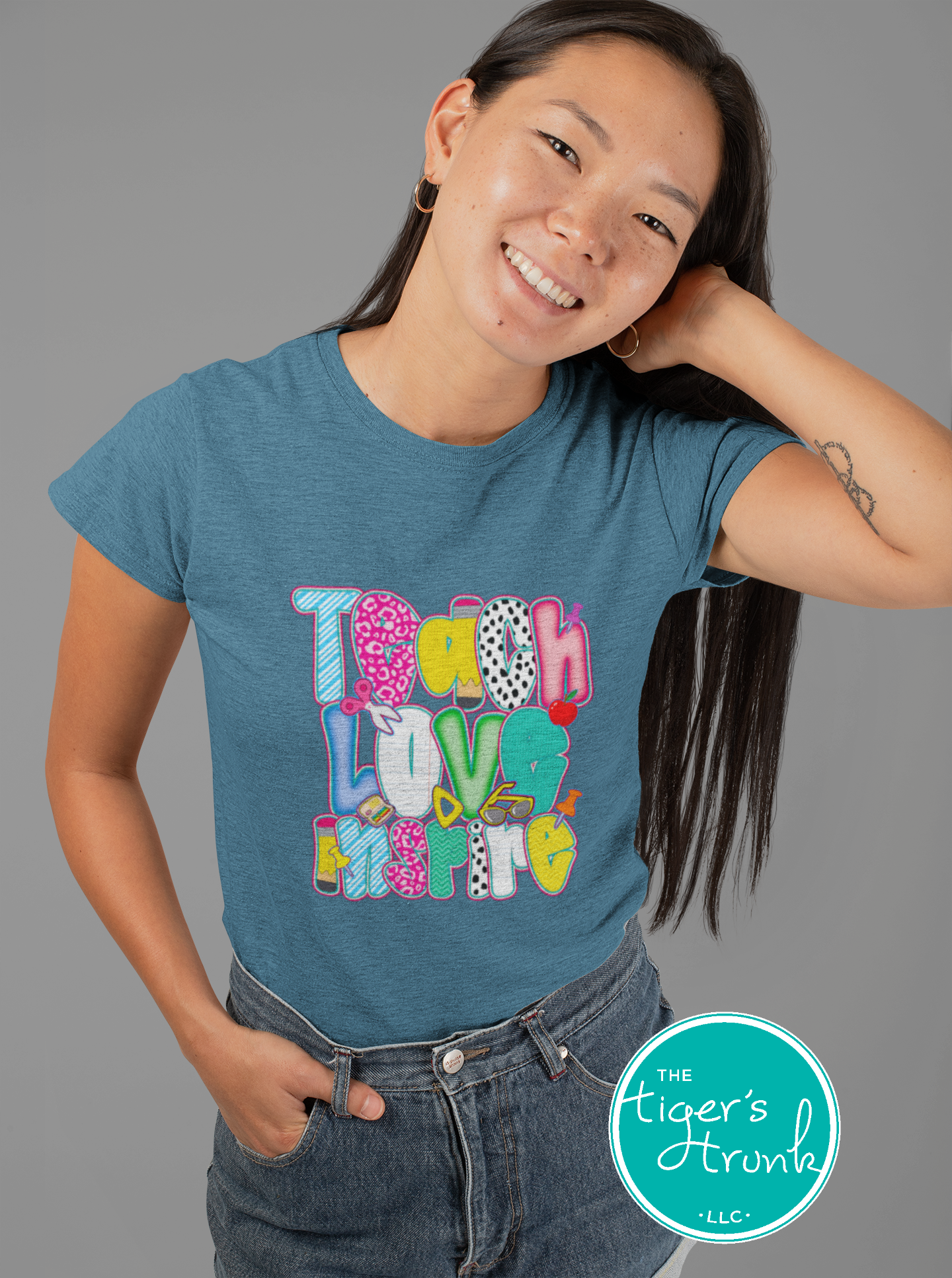 T-shirt with "Teach Love Inspire" message, inspirational and positive graphic tee for teachers and school staff