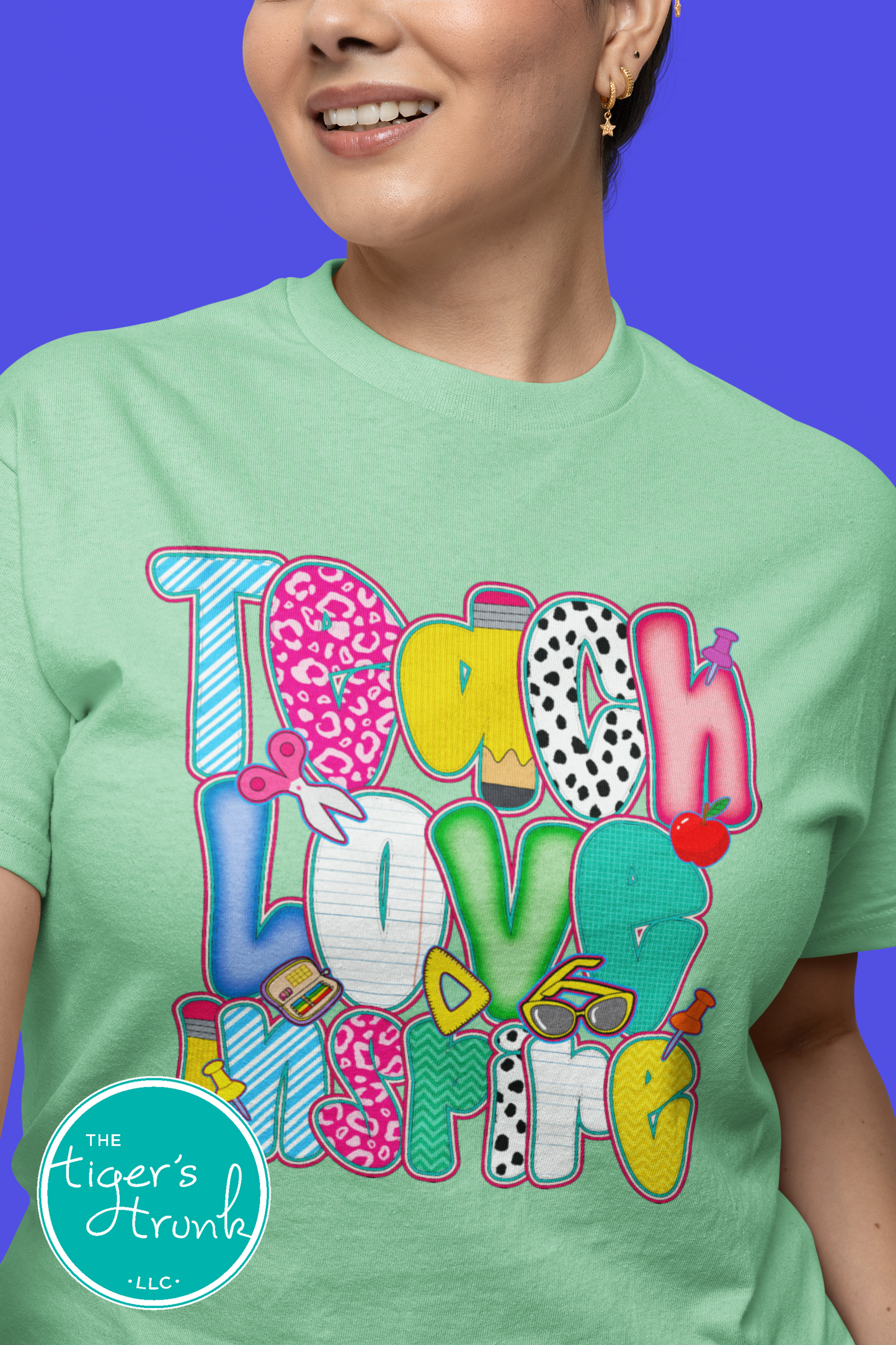 T-shirt with "Teach Love Inspire" message, inspirational and positive graphic tee for teachers and school staff