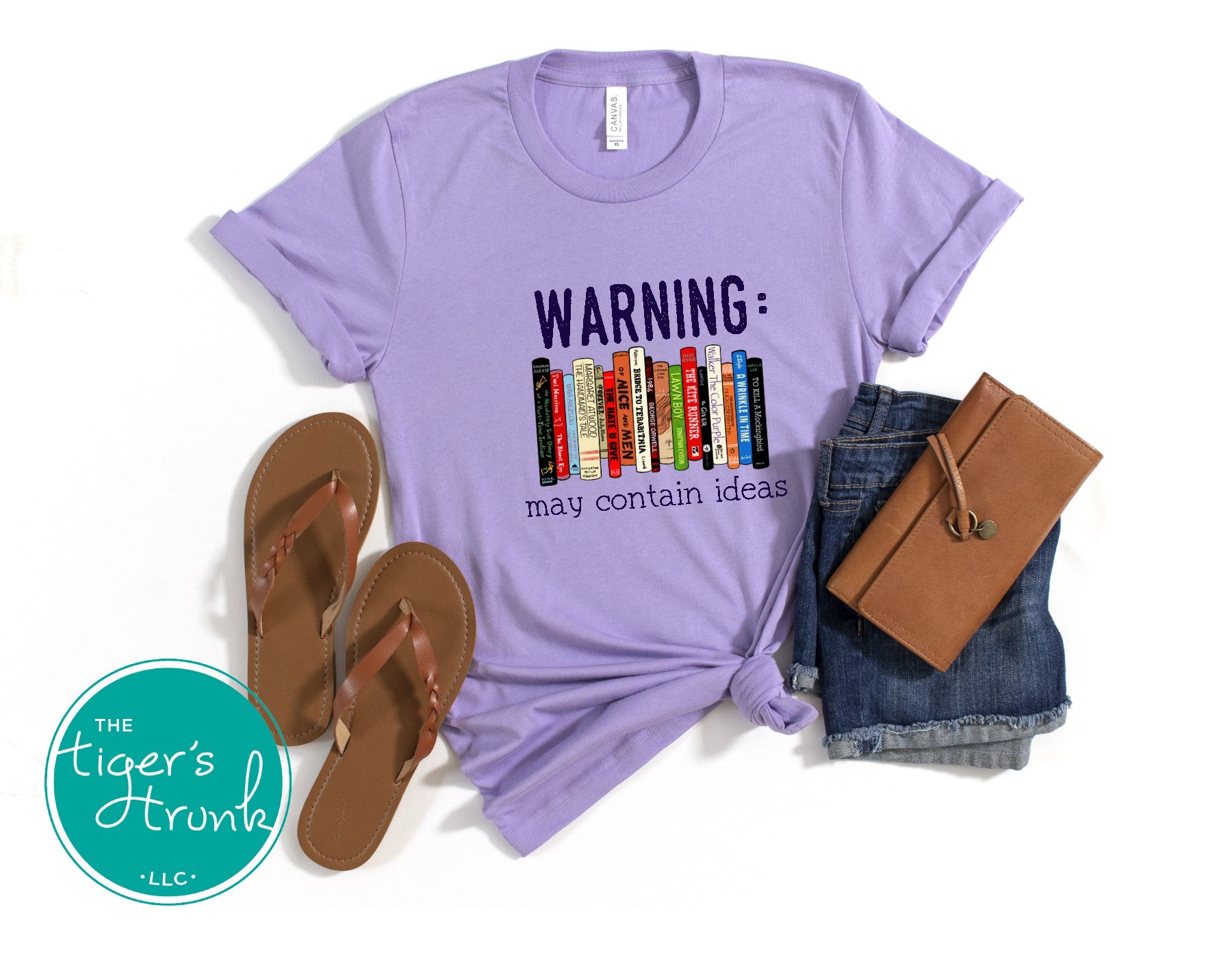 Graphic t-shirt featuring banned books and the phrase "Warning: May Contain Ideas," ideal for librarians, educators, and book lovers