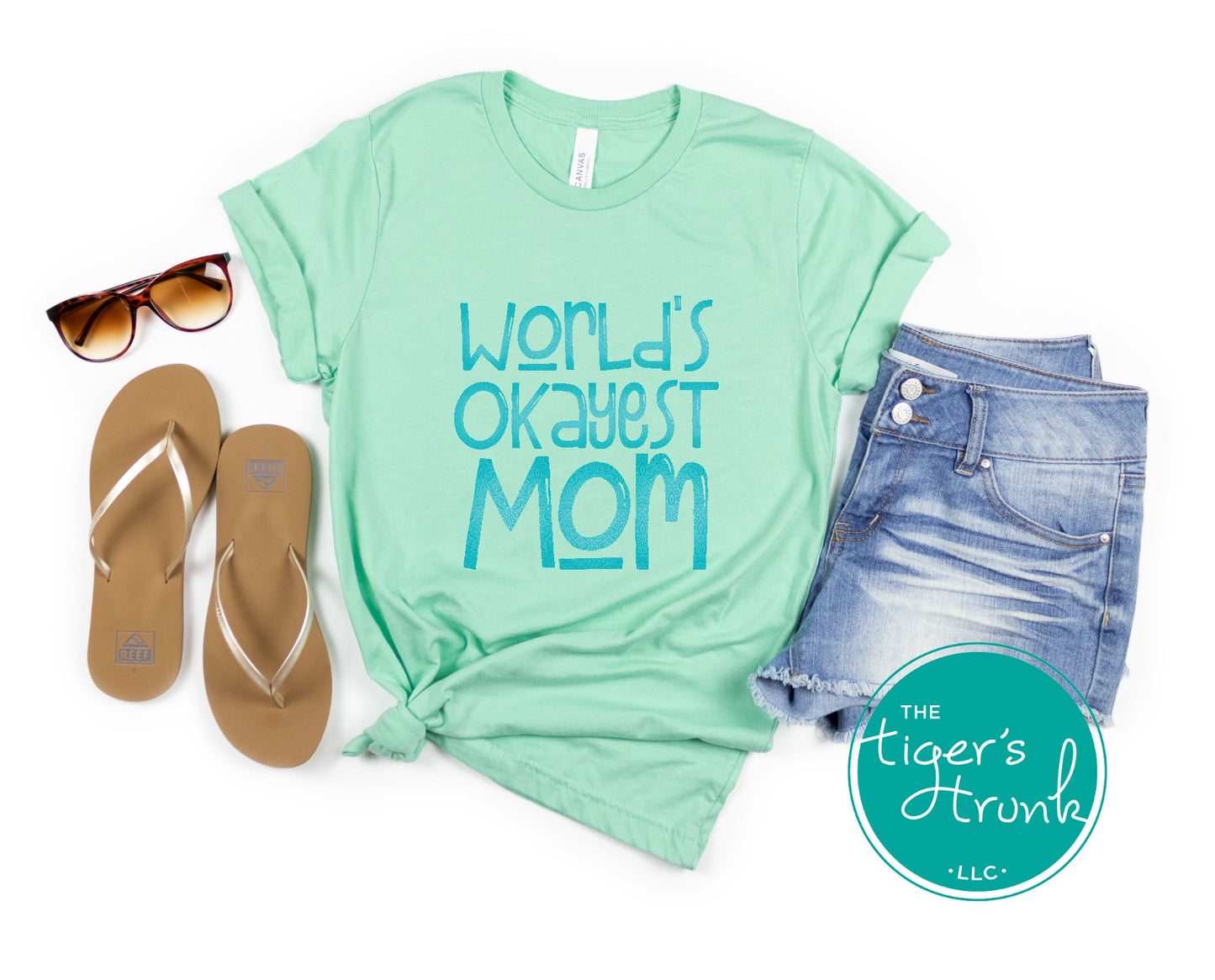 T-shirt with "World’s Okayest Mom" funny and casual design, perfect for Mother's Day, birthdays, or everyday mom life wear