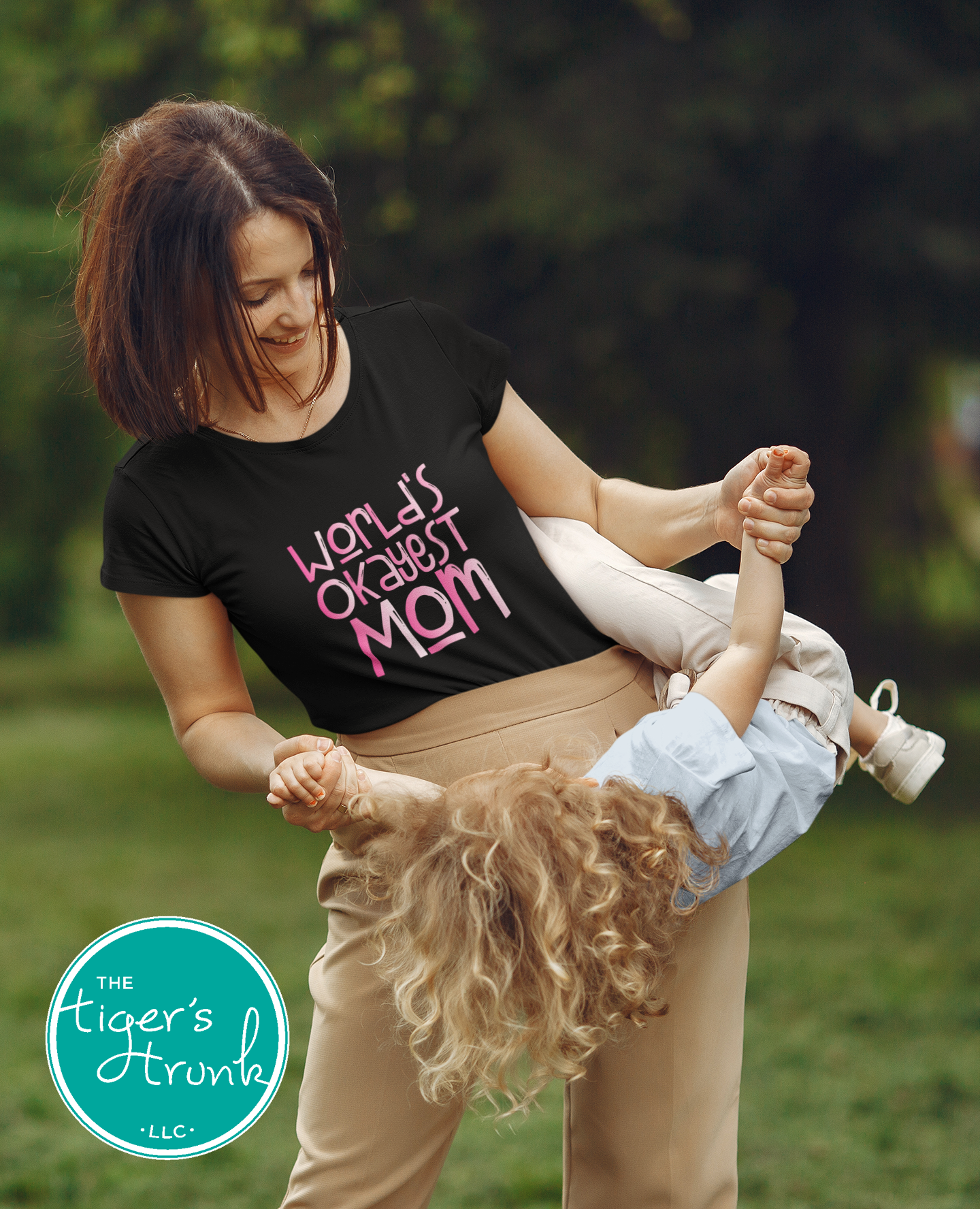 T-shirt with "World’s Okayest Mom" funny and casual design, perfect for Mother's Day, birthdays, or everyday mom life wear